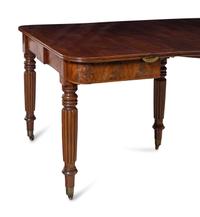 A Regency Mahogany Concertina-Action Extension Dining Table