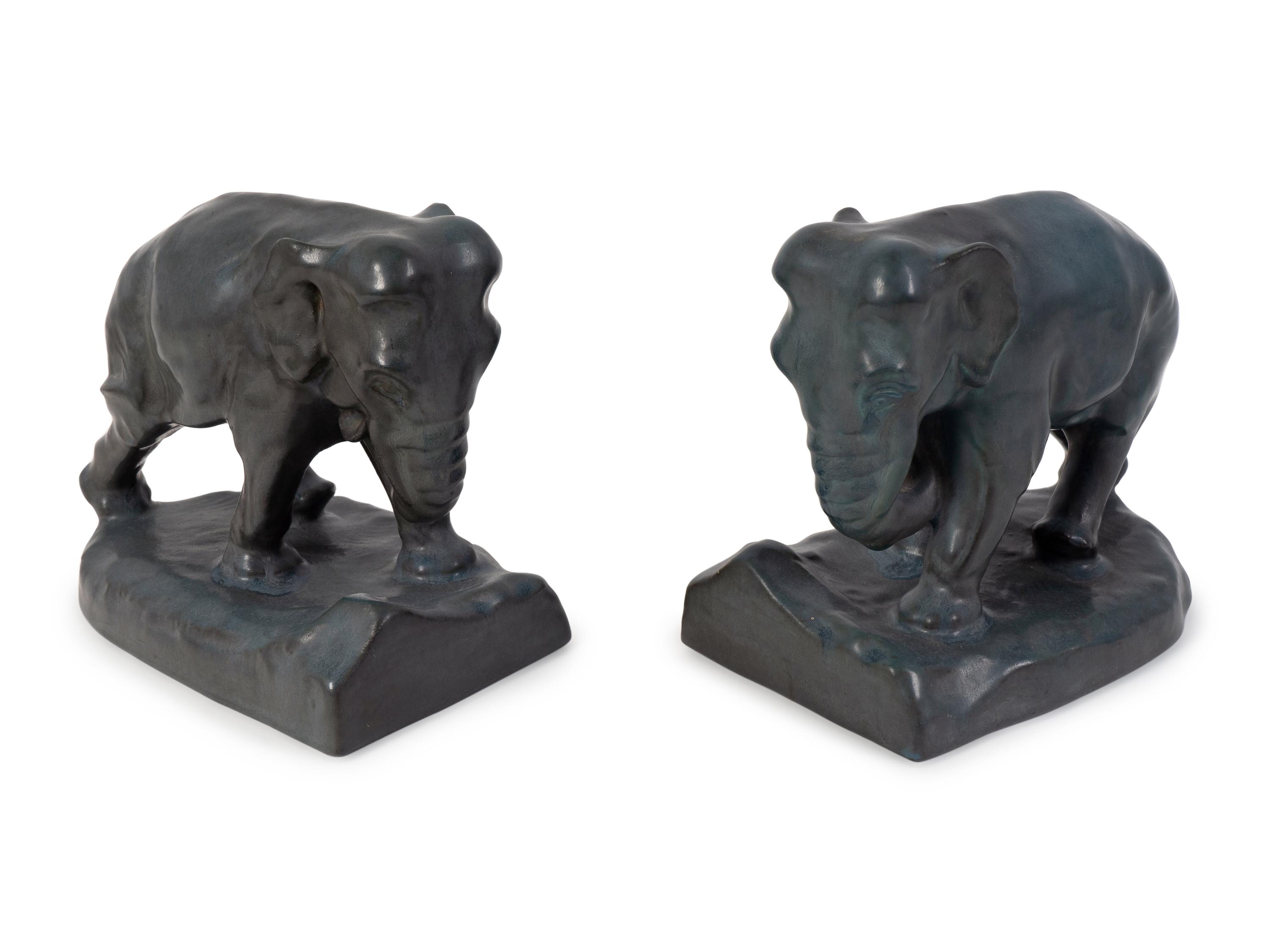 A Pair of Rookwood Green-Glazed Pottery Elephant Bookends — DATED 1923