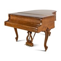 A Steinway and Sons Walnut Grand Piano