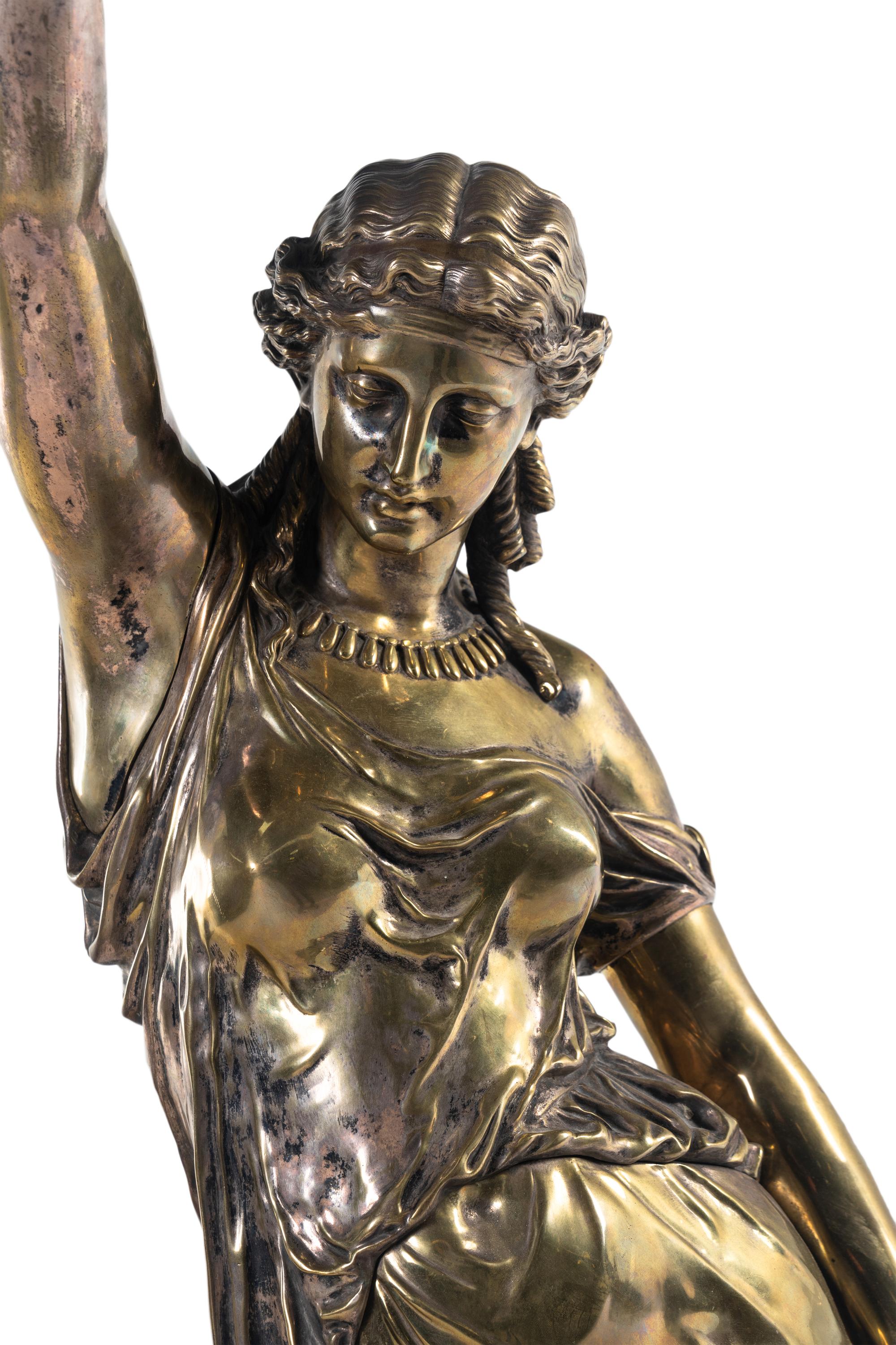 A Continental Silvered Bronze Figural Torchère