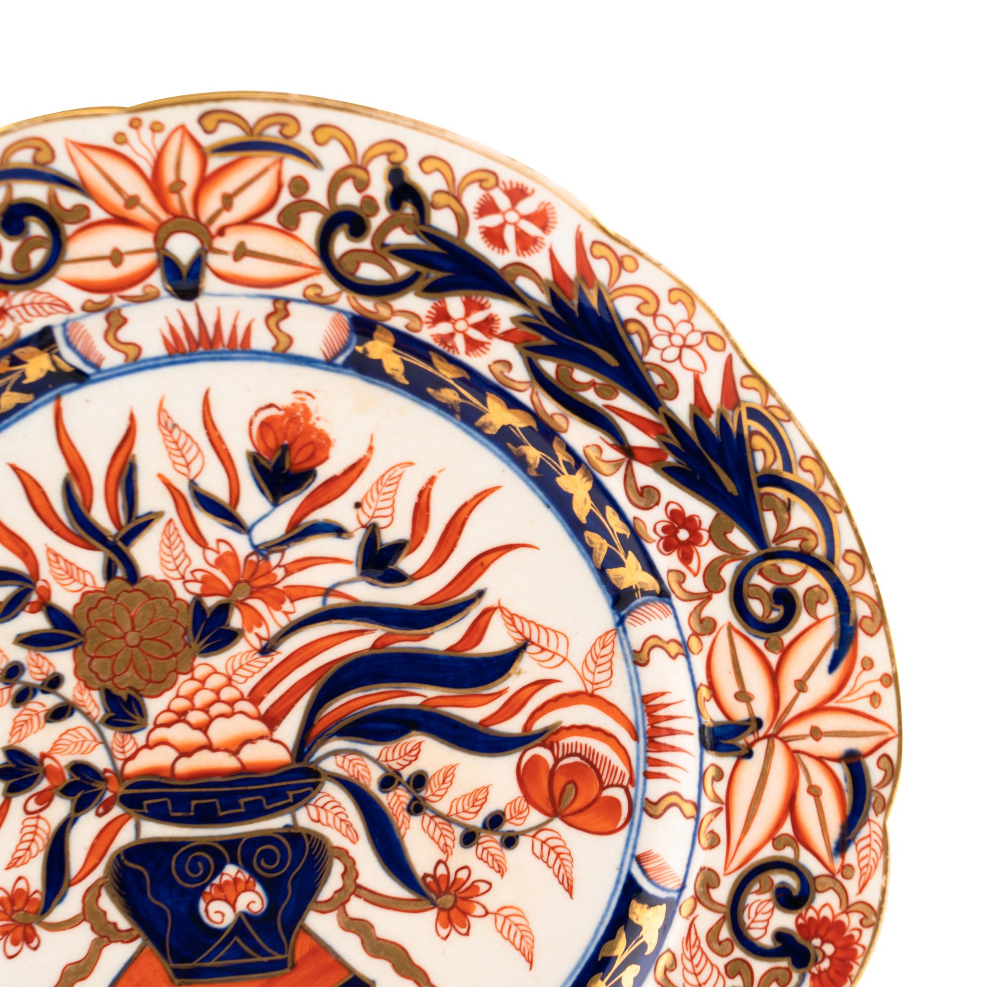 A Set of Eight English Imari Palette Porcelain Plates