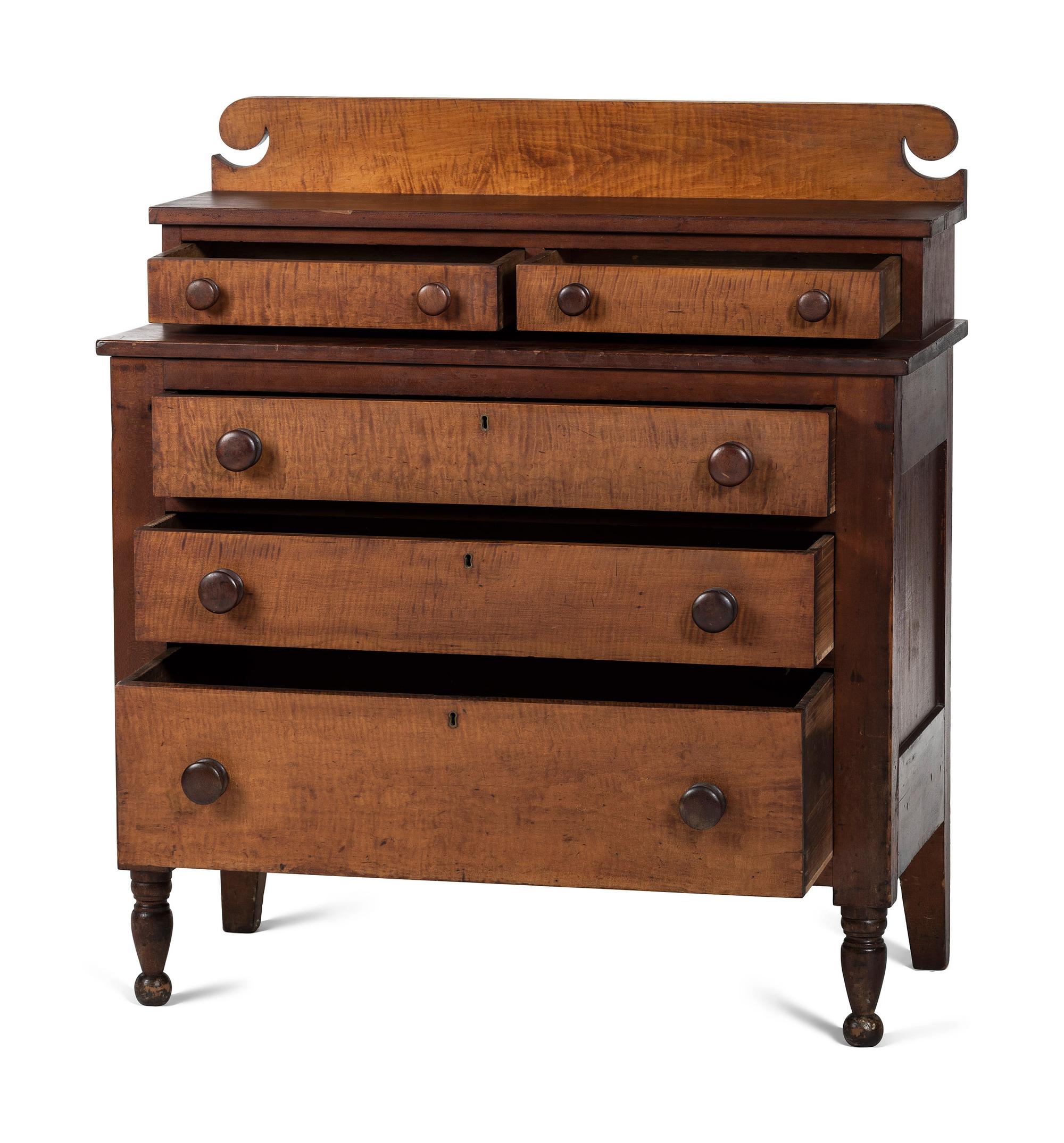 A Classical Tiger Maple and Cherrywood Chest of Drawers