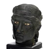 A Group of Three Greek Style Bronze Heads