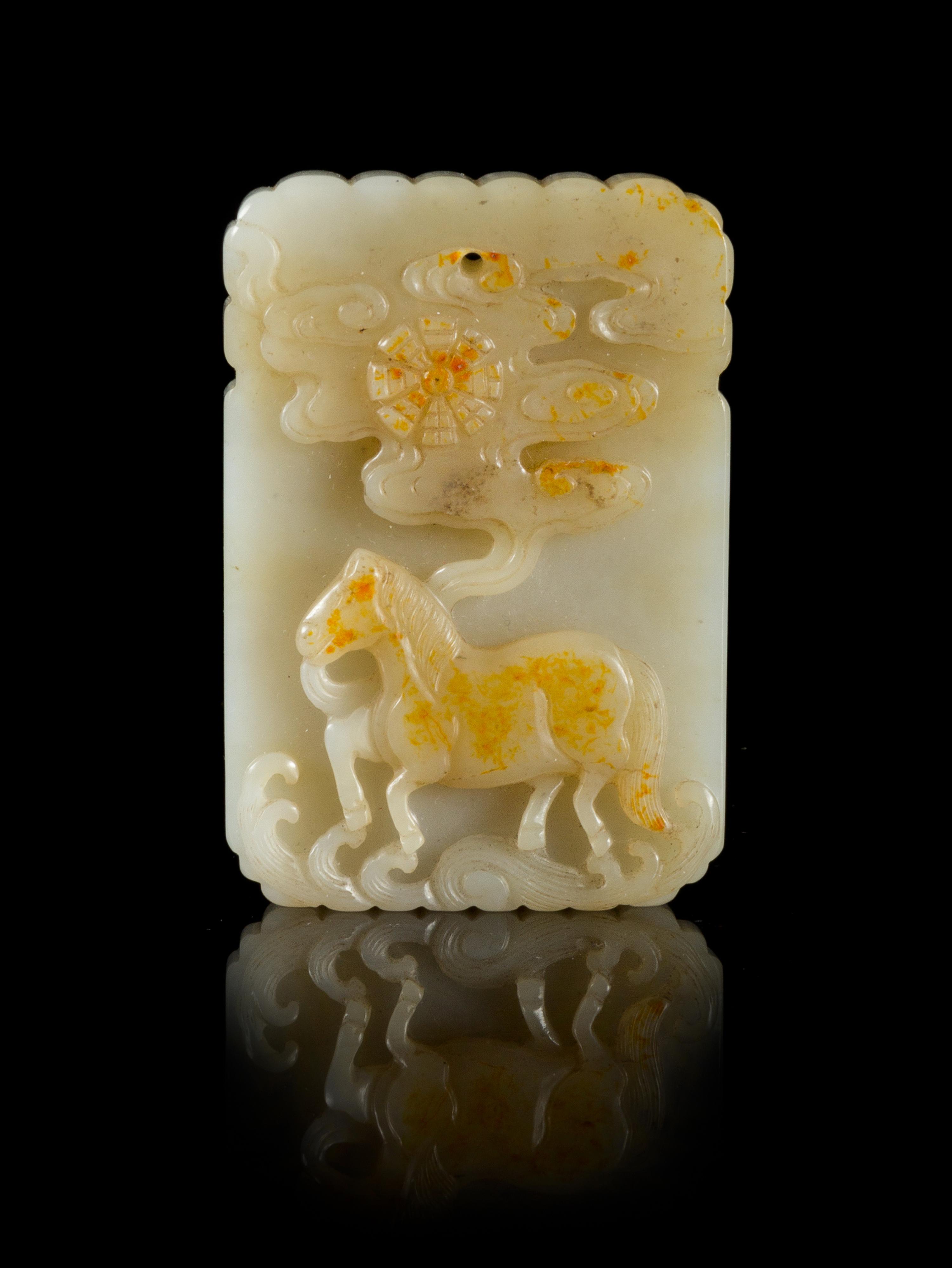 A White Jade Plaque Length 2 1/2 x width 1 3/4 inches.