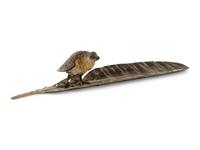 An Austrian Cold-Painted Bronze Figure of a Bird of Prey Perched on a Feather
