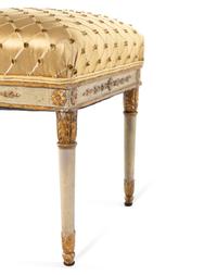 A Pair of Italian White-Painted and Parcel Gilt Carved Benches