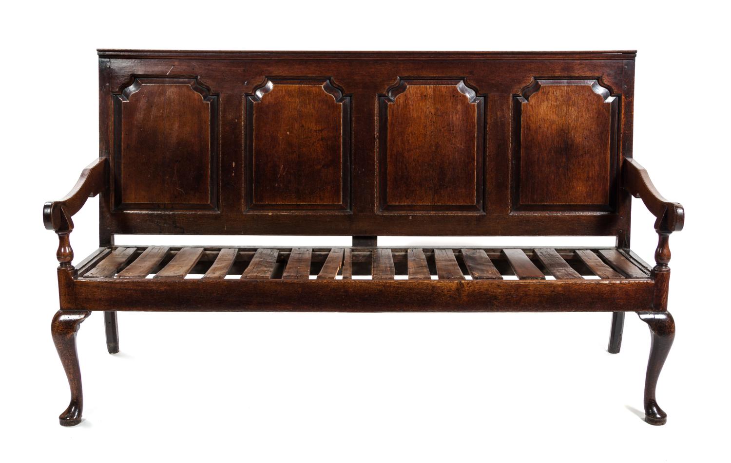 An English Oak Settle, Width 72 inches.