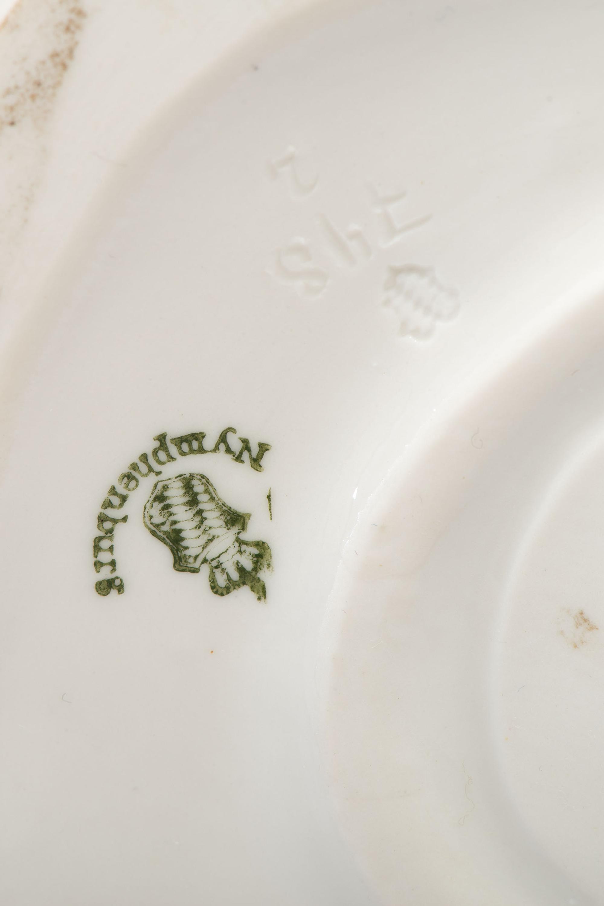 A Pair of Nymphenburg Porcelain Cockatoos