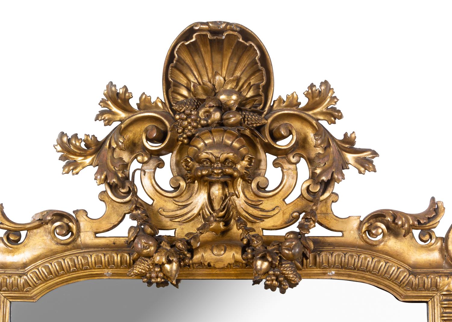 A Large Italian Baroque Style Giltwood Mirror