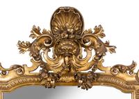 A Large Italian Baroque Style Giltwood Mirror