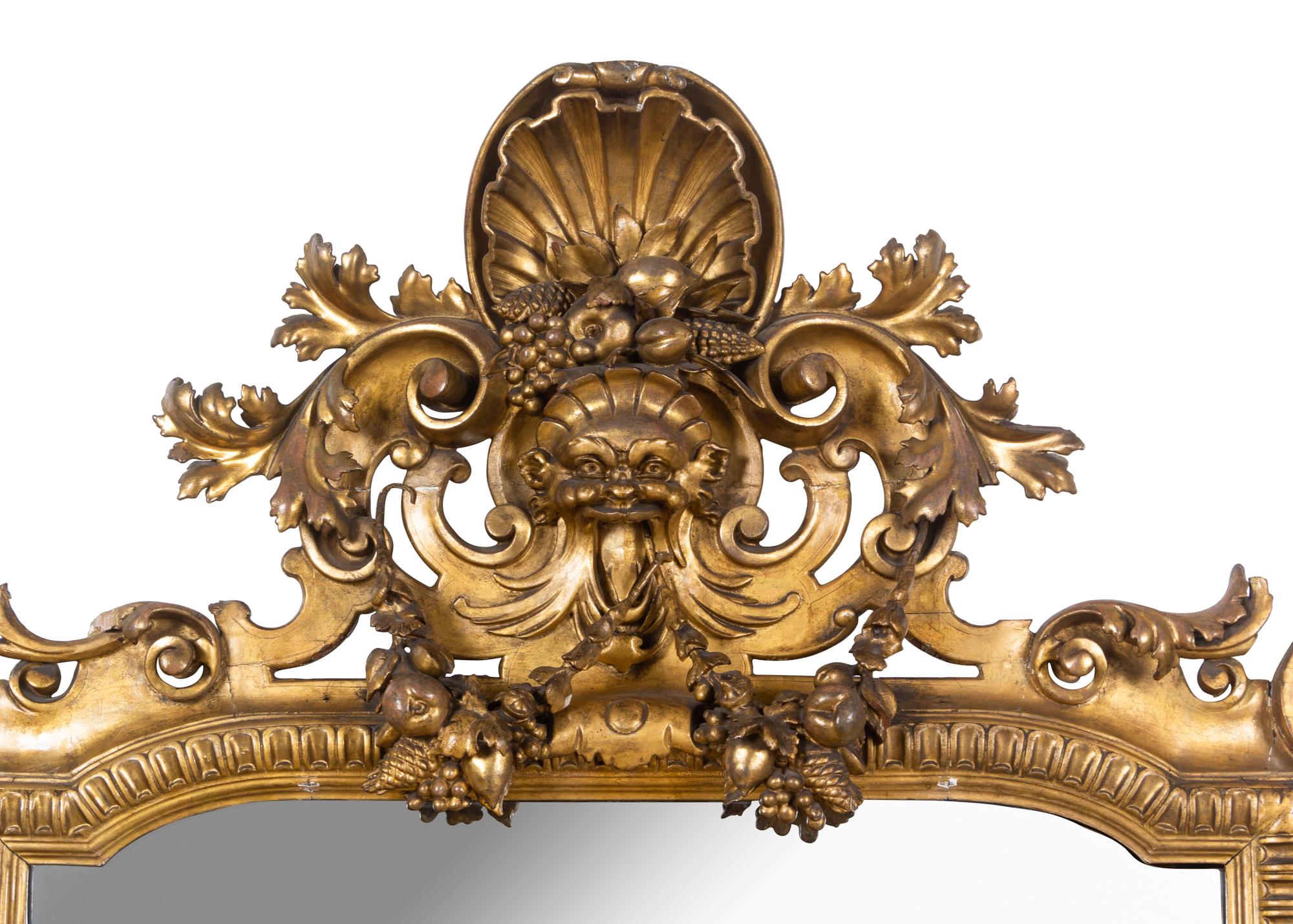 A Large Italian Baroque Style Giltwood Mirror