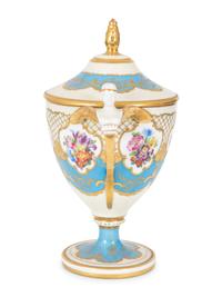 A Fürstenberg Porcelain Gilded Two-Handled Figural Urn