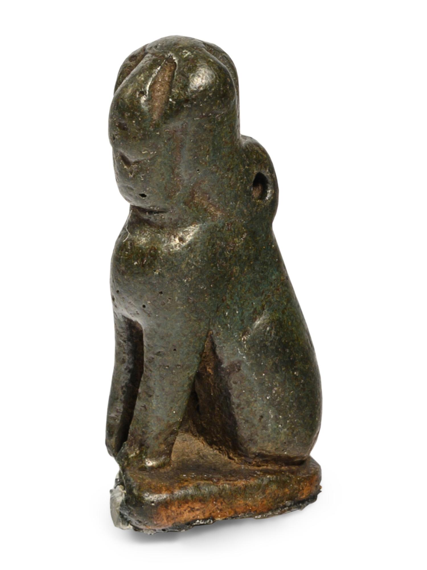 An Egyptian Bronze Sphinx