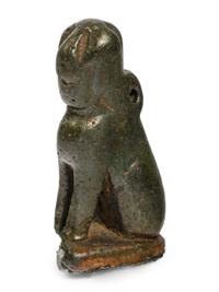 An Egyptian Bronze Sphinx