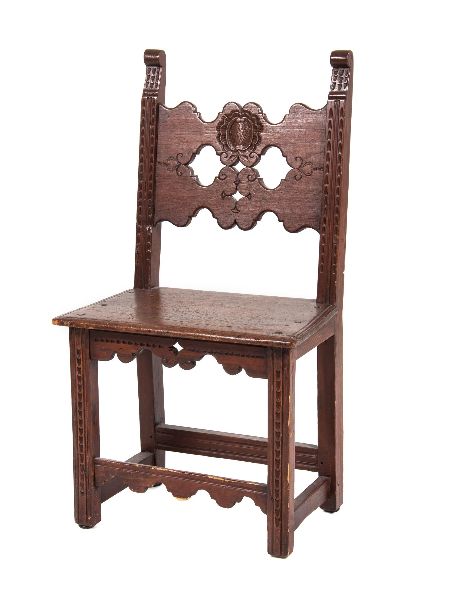 A Jacobean Style Walnut Hall Chair Height 37 3/4 inches.