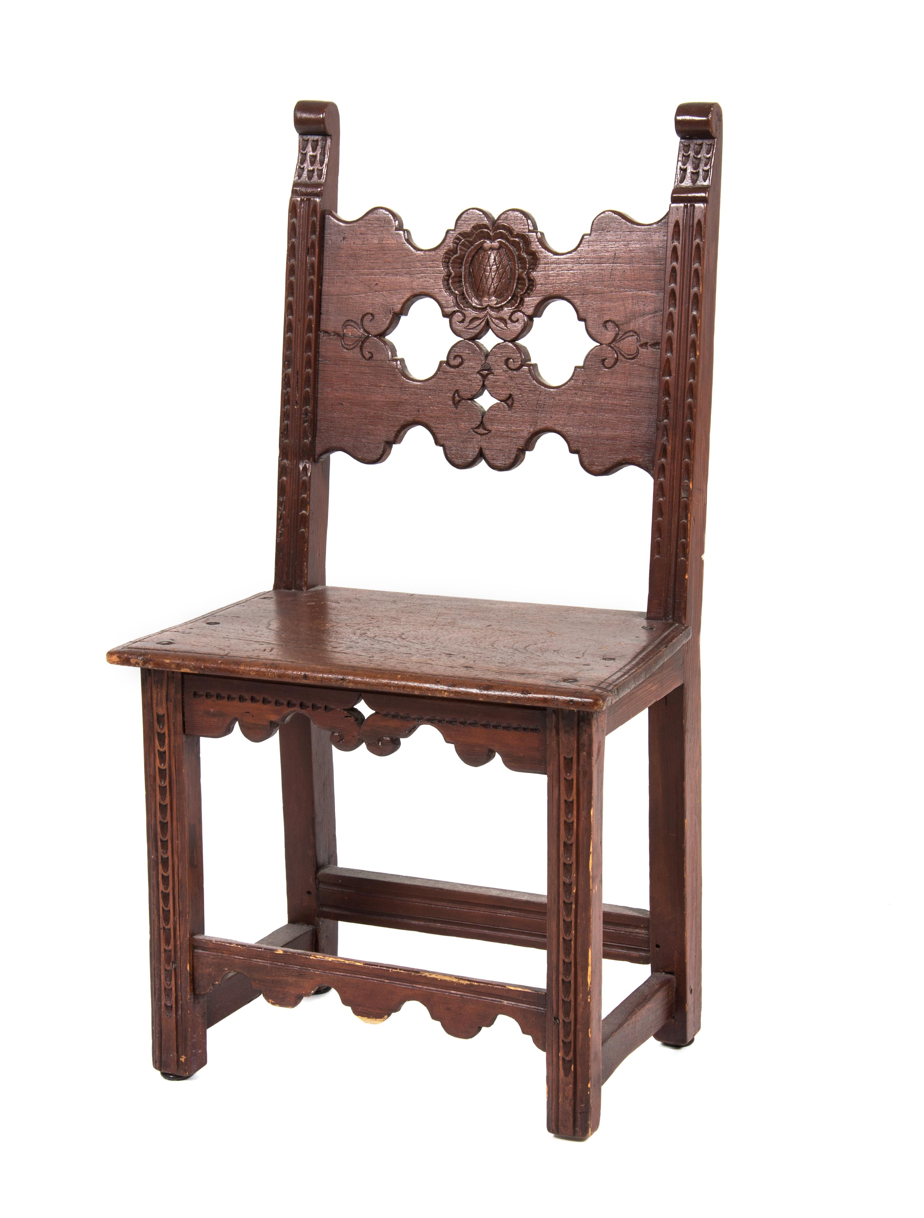 A Jacobean Style Walnut Hall Chair Height 37 3/4 inches.