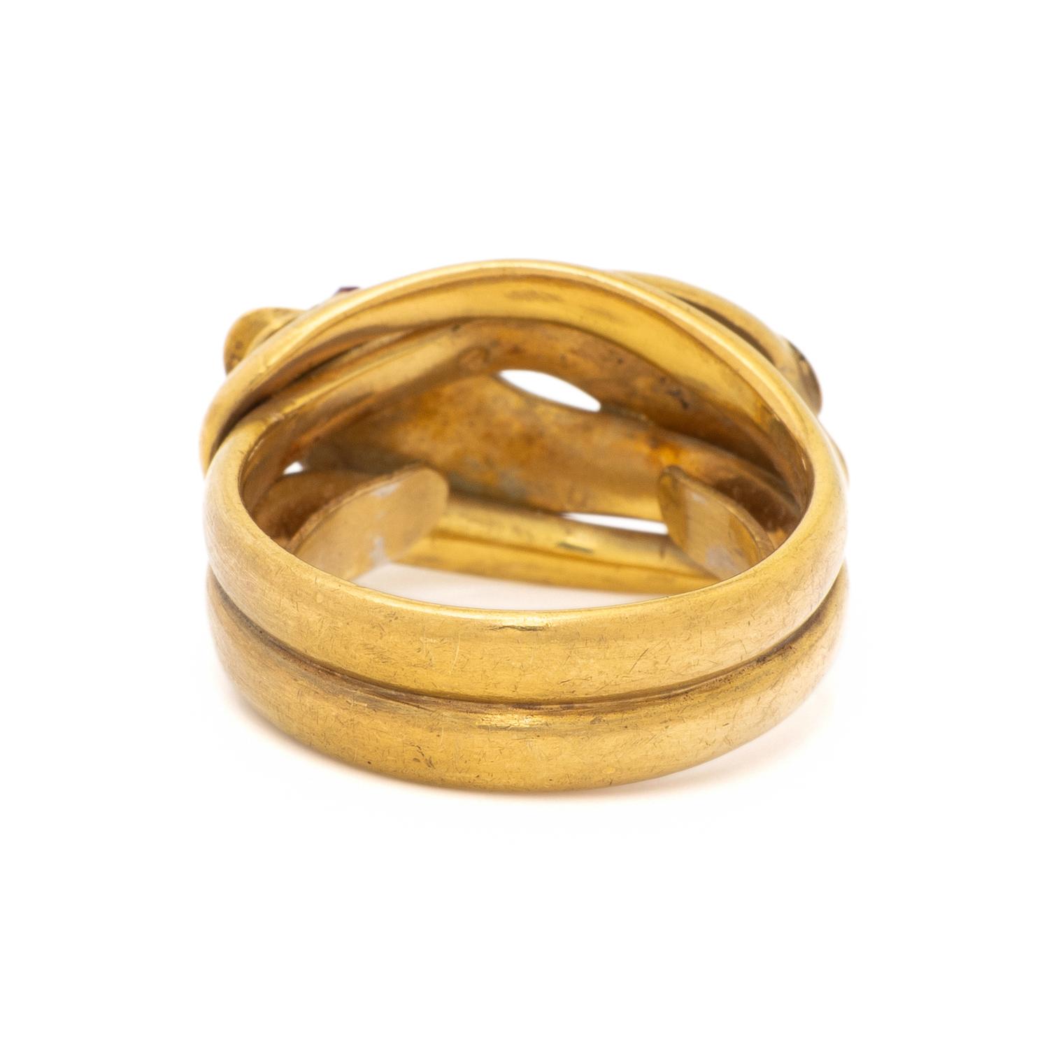 BRITISH, YELLOW GOLD AND RUBY SNAKE RING