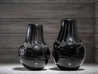 Pair of Carved Blackware Pottery Vases