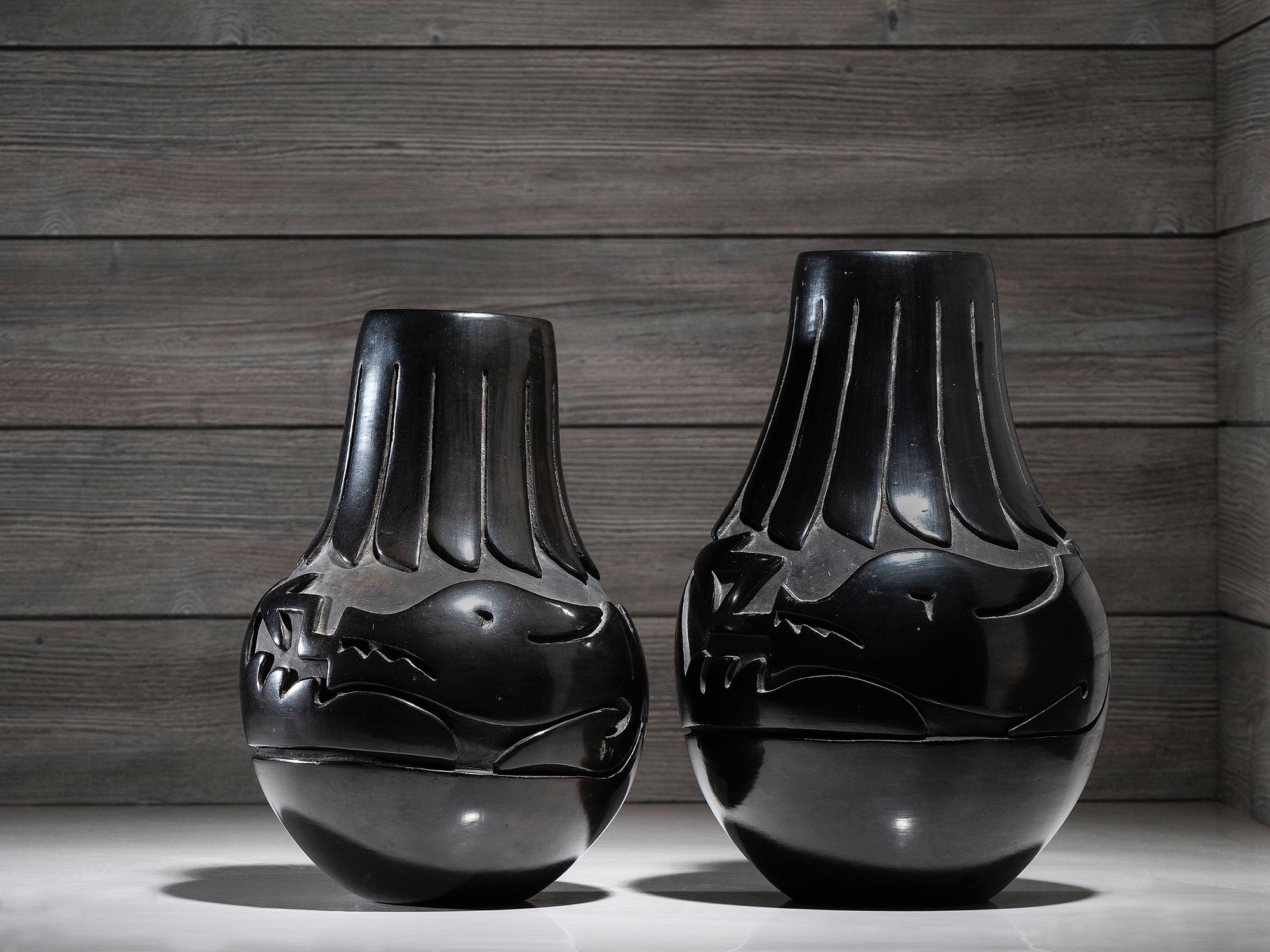 Pair of Carved Blackware Pottery Vases