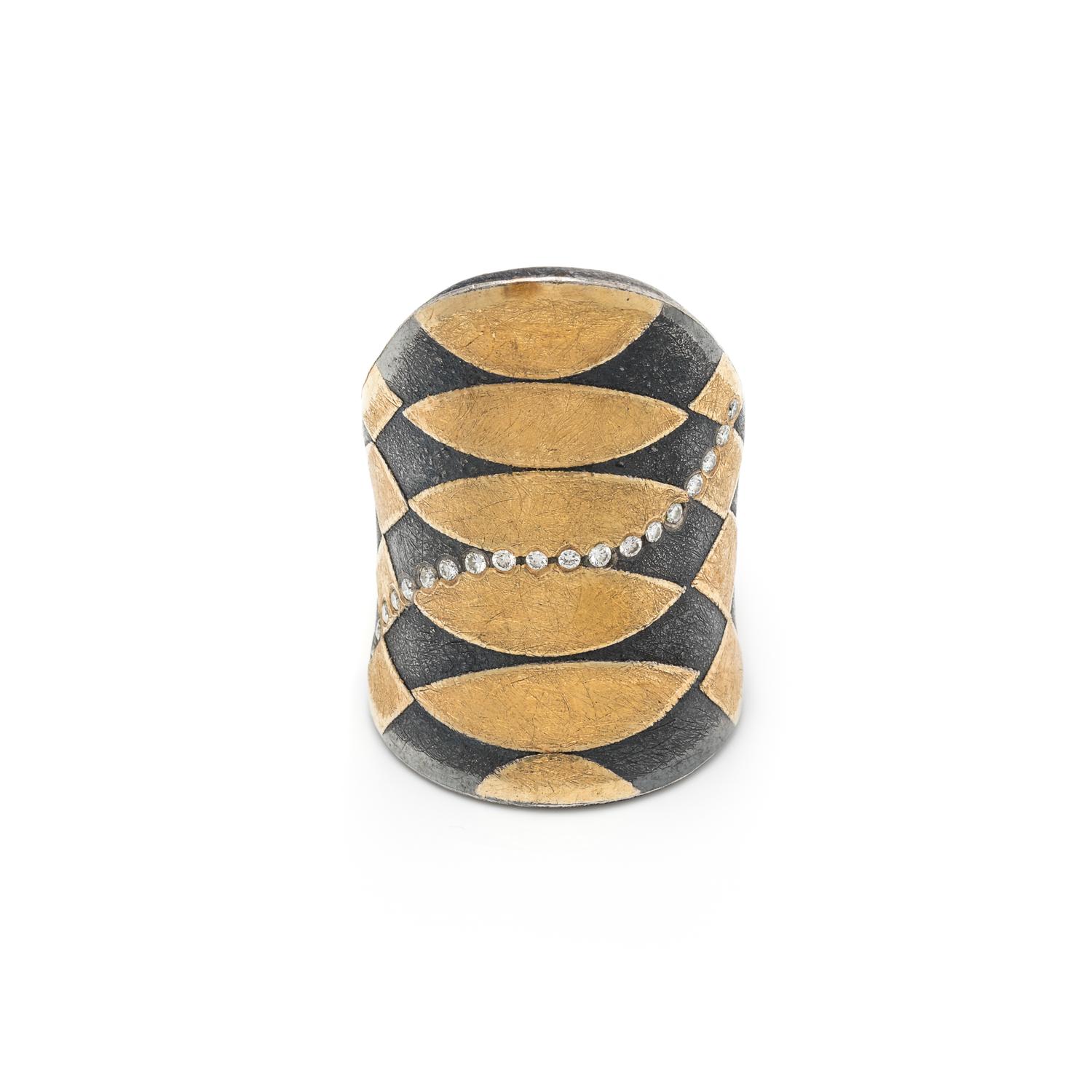STERLING SILVER, YELLOW GOLD AND DIAMOND RING