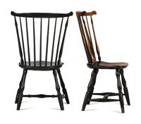 A Black-Painted Volute Carved Comb-Back Compass-Seat Windsor Side Chair
