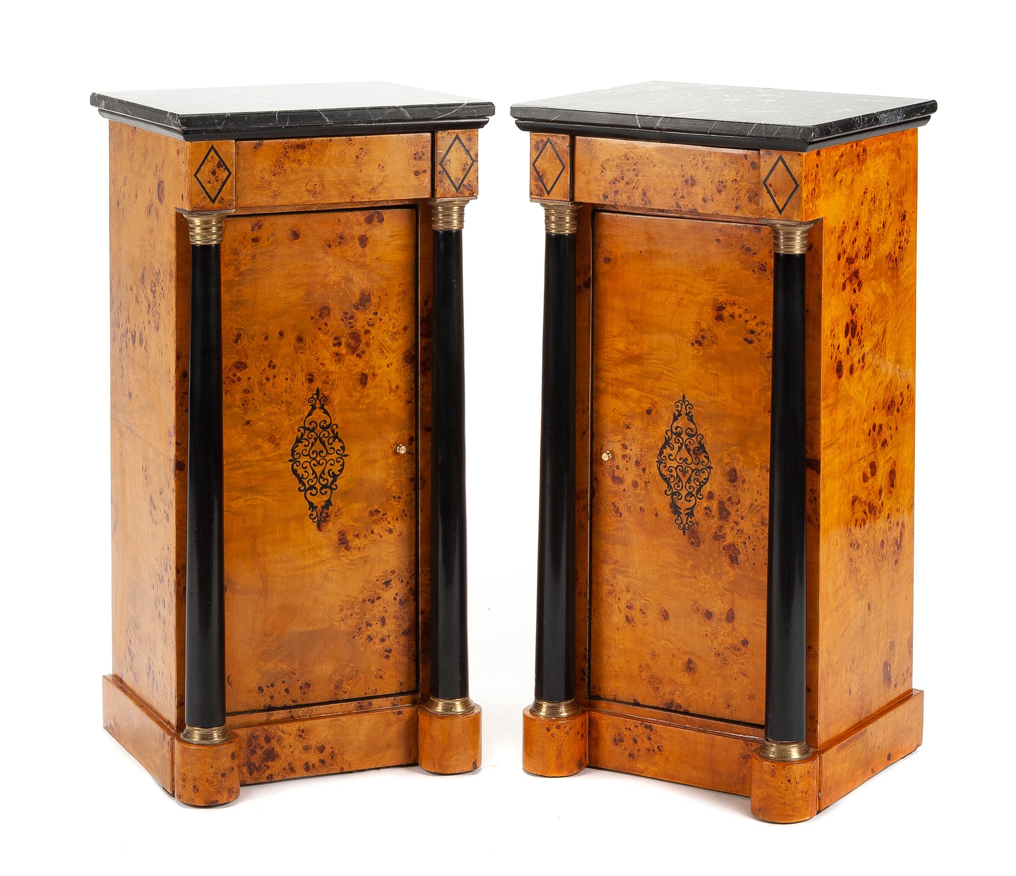A Pair of Empire Style Parcel Ebonized Side Cabinets Height 31 x width 15 1/2 x depth 14 inches.