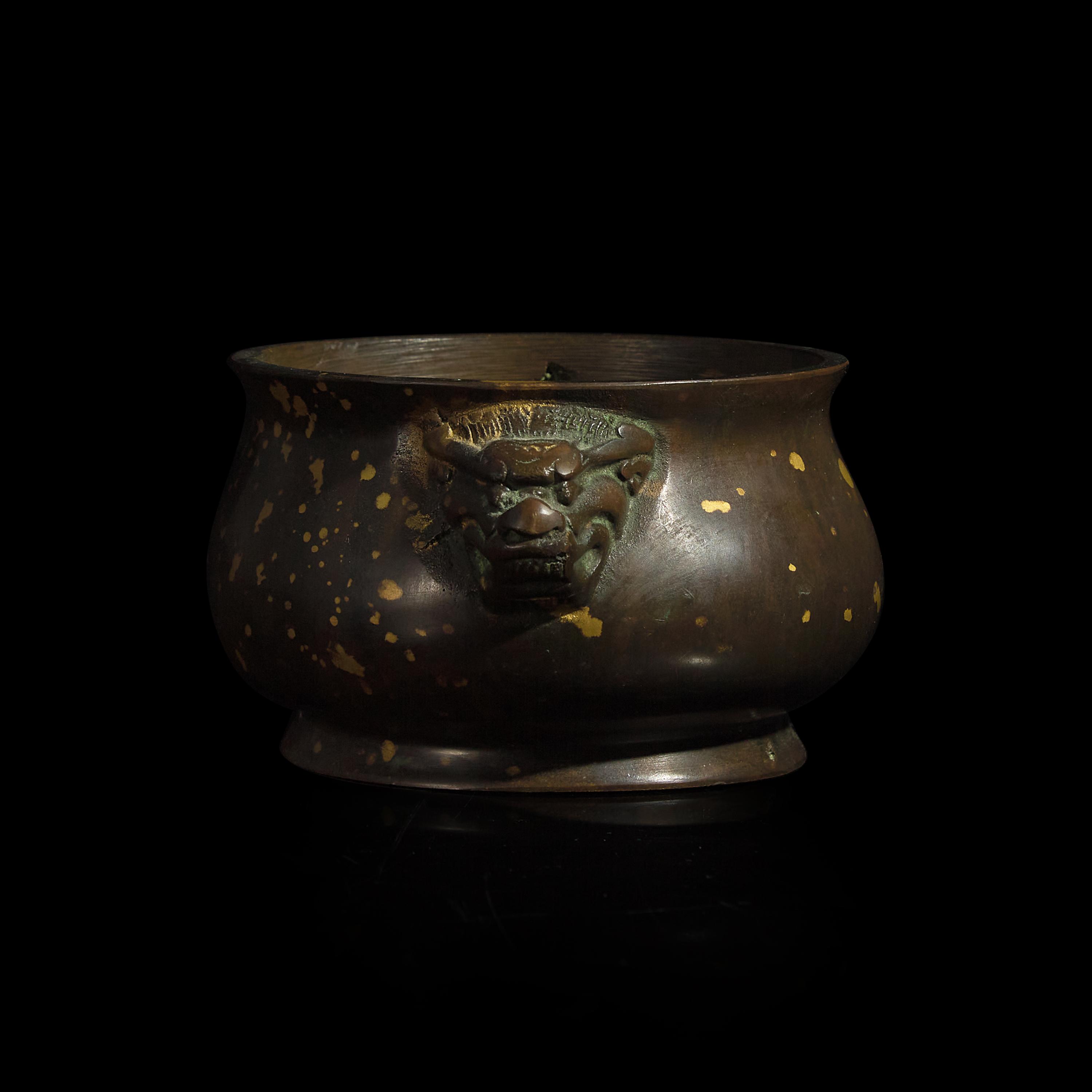 A Chinese "Gold-Splashed" Patinated Bronze Censer 灑金銅獅耳爐