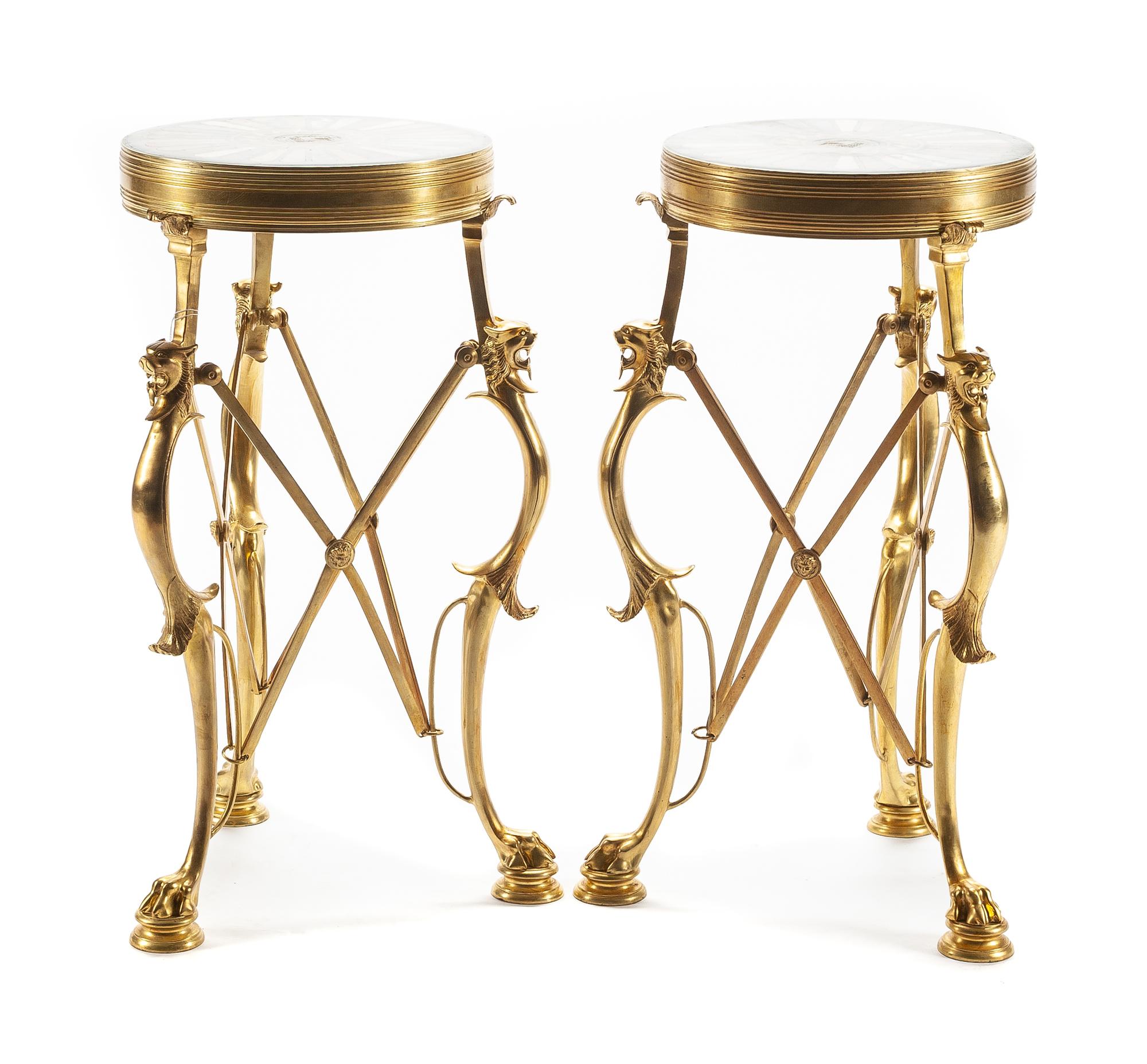 A Pair of French Neoclassical Style Gilt Bronze and Specimen Marble Gueridons Height 27 x diameter of top 15 inches.