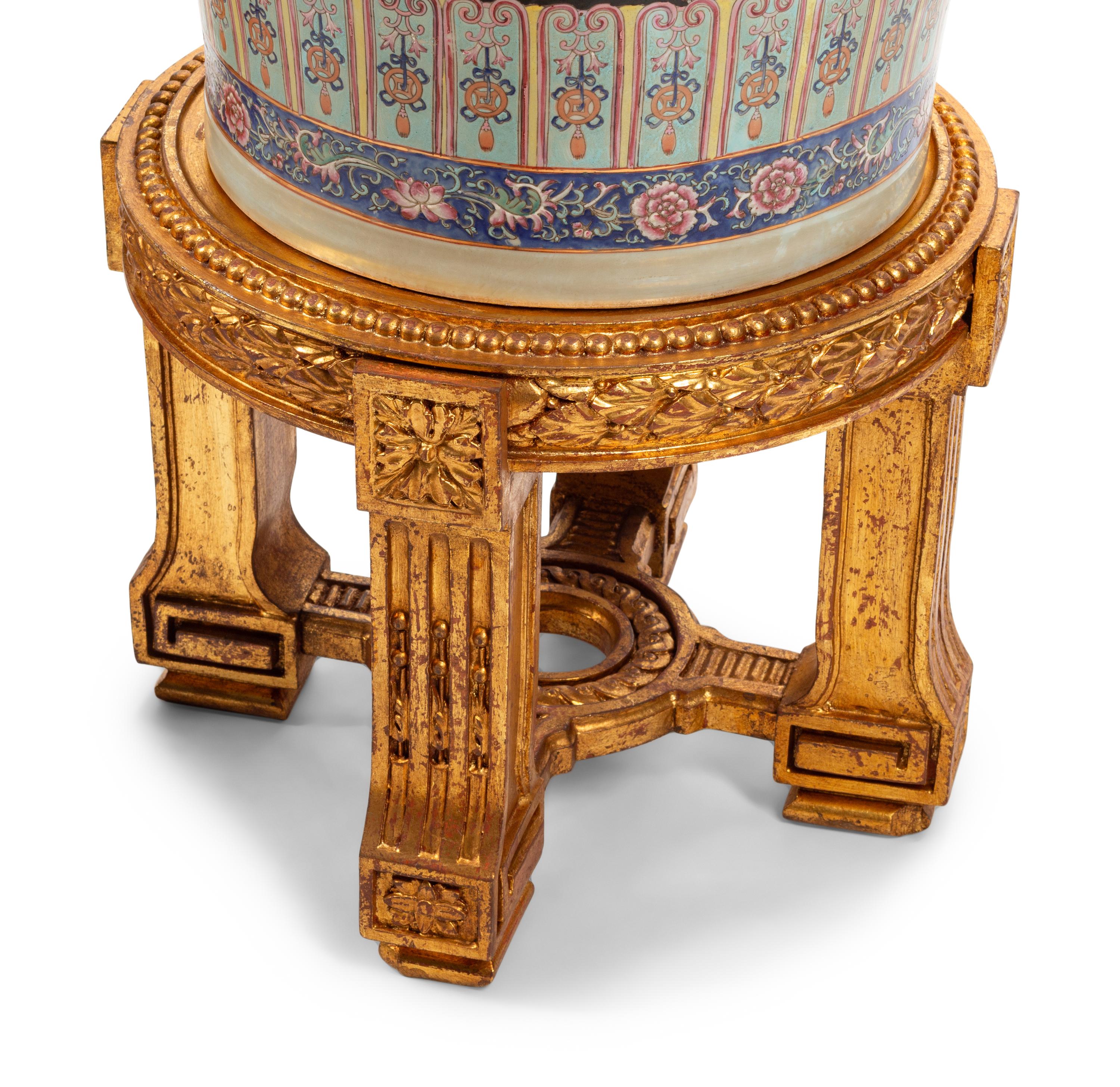 A Pair of Massive Chinese Enameled Porcelain Vases with Giltwood Stands