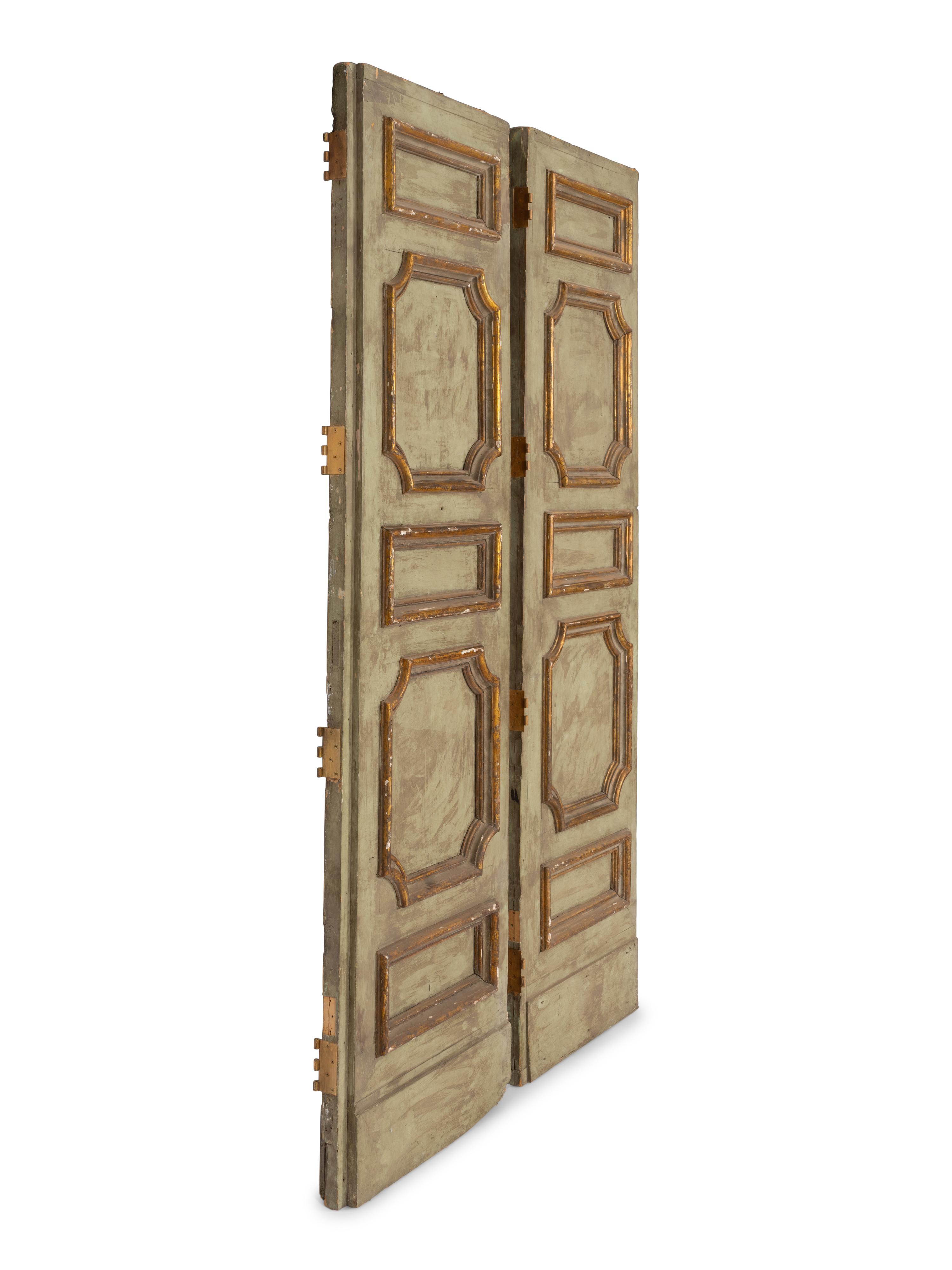 A Pair of Large Italian Blue Painted and Parcel Gilt Doors