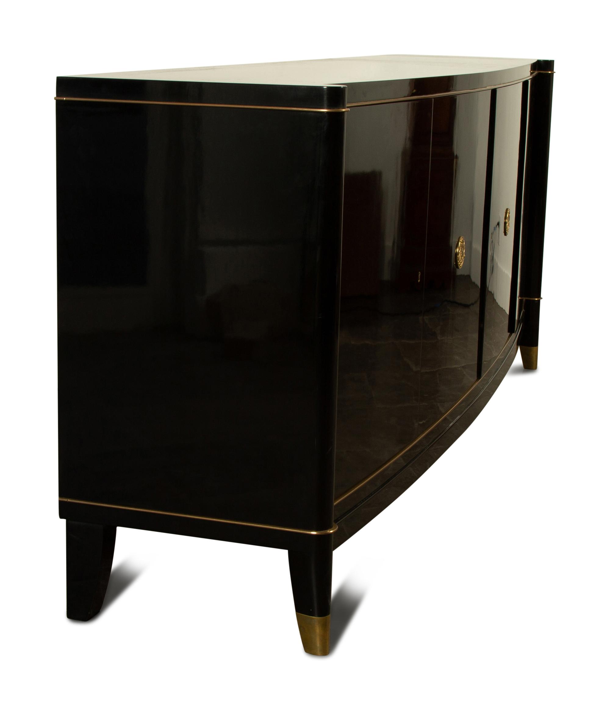 An Art Deco De Coene Freres Ebonized Cabinet — 20TH CENTURY