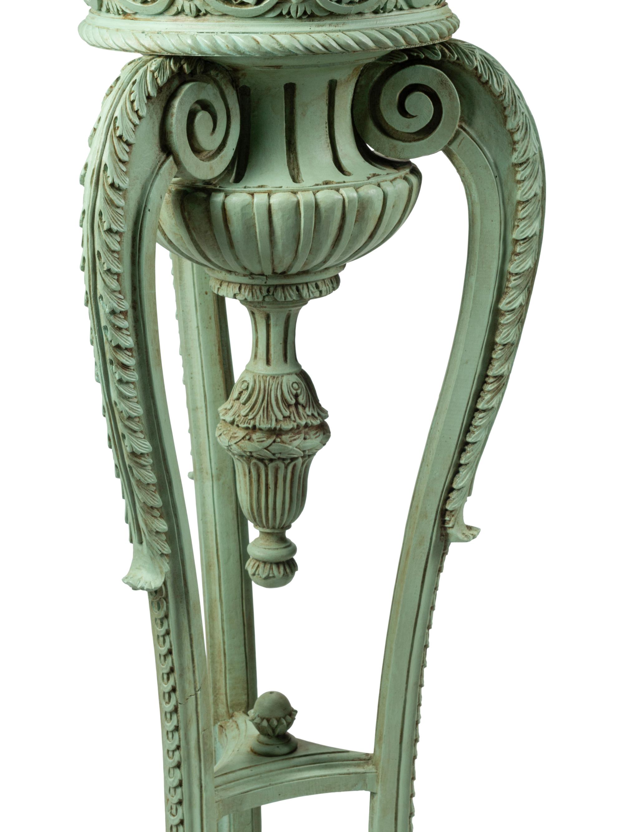 A Pair of Louis XV Style Carved and Green-Painted Jardinières with Liners