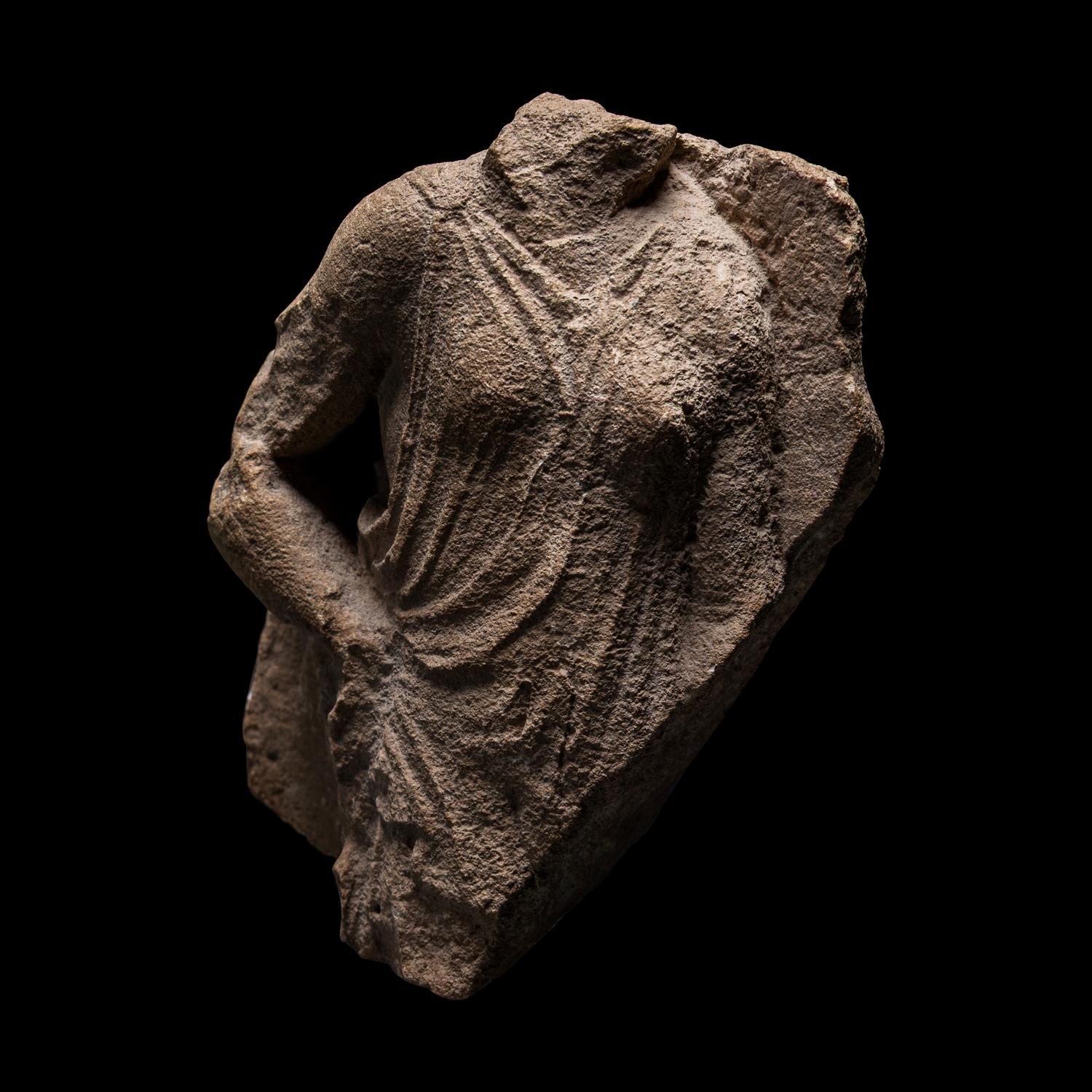 A Tarantine Limestone Relief of a Draped Female