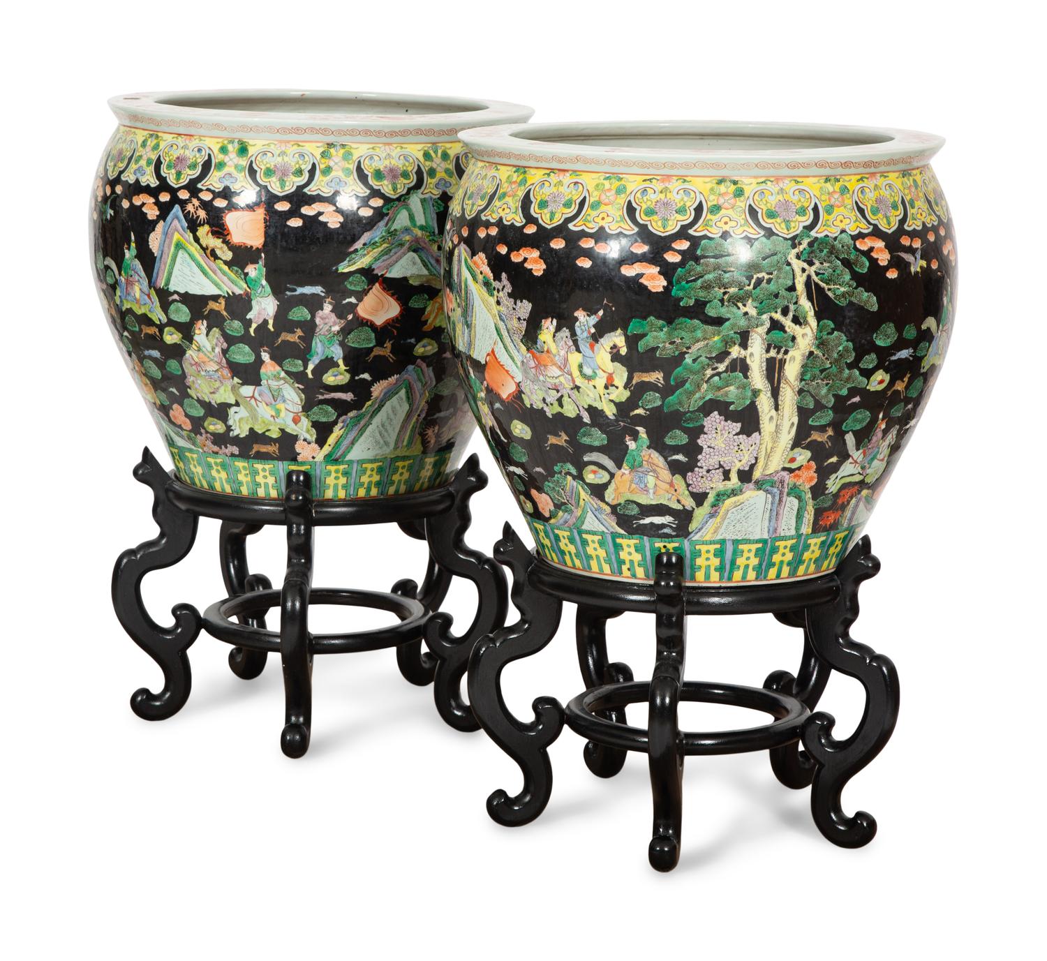 A Pair of Large Famille Noir Porcelain Fish Bowls on Teak Stands