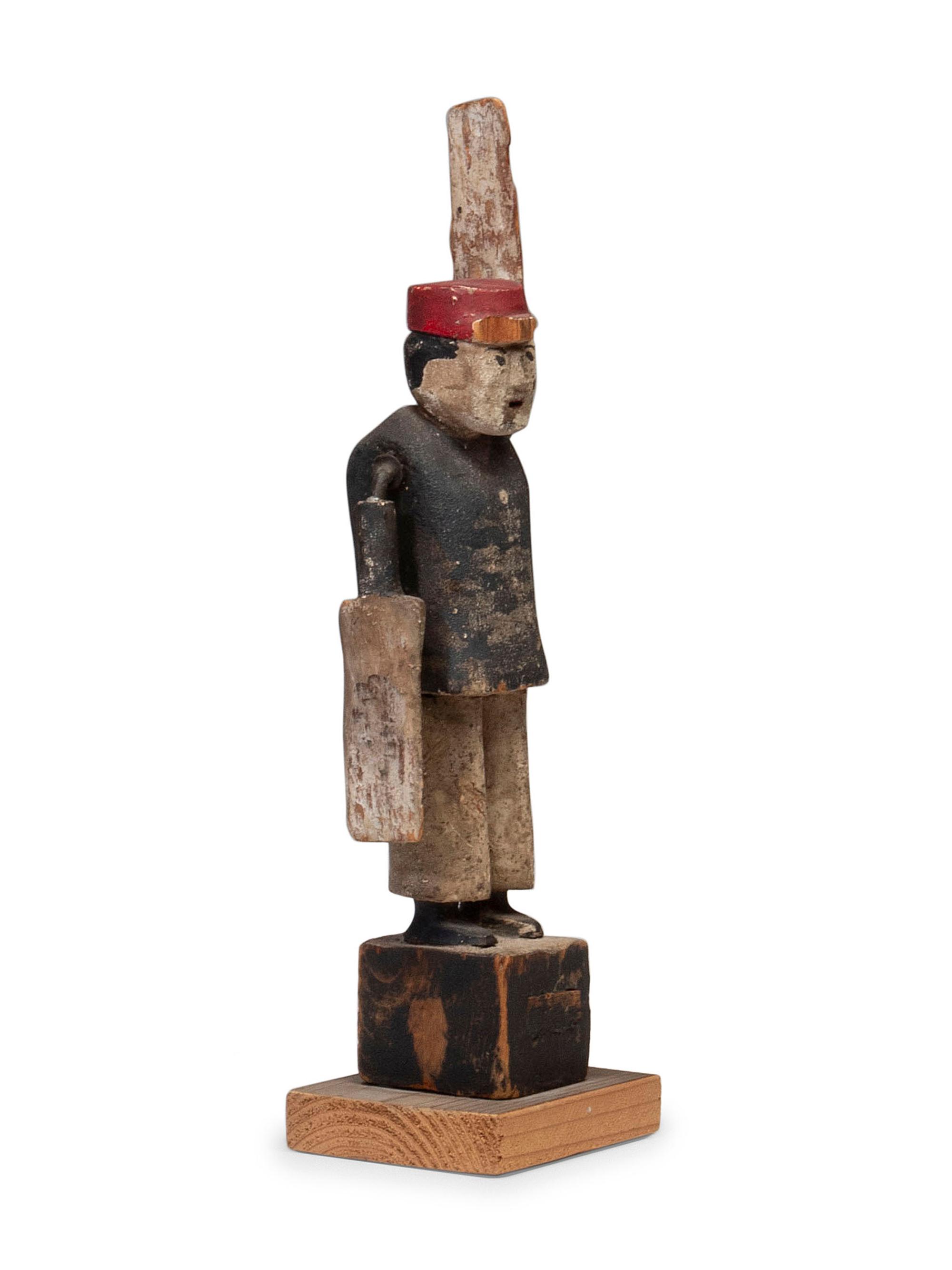 A Carved and Painted Wood Whirligig