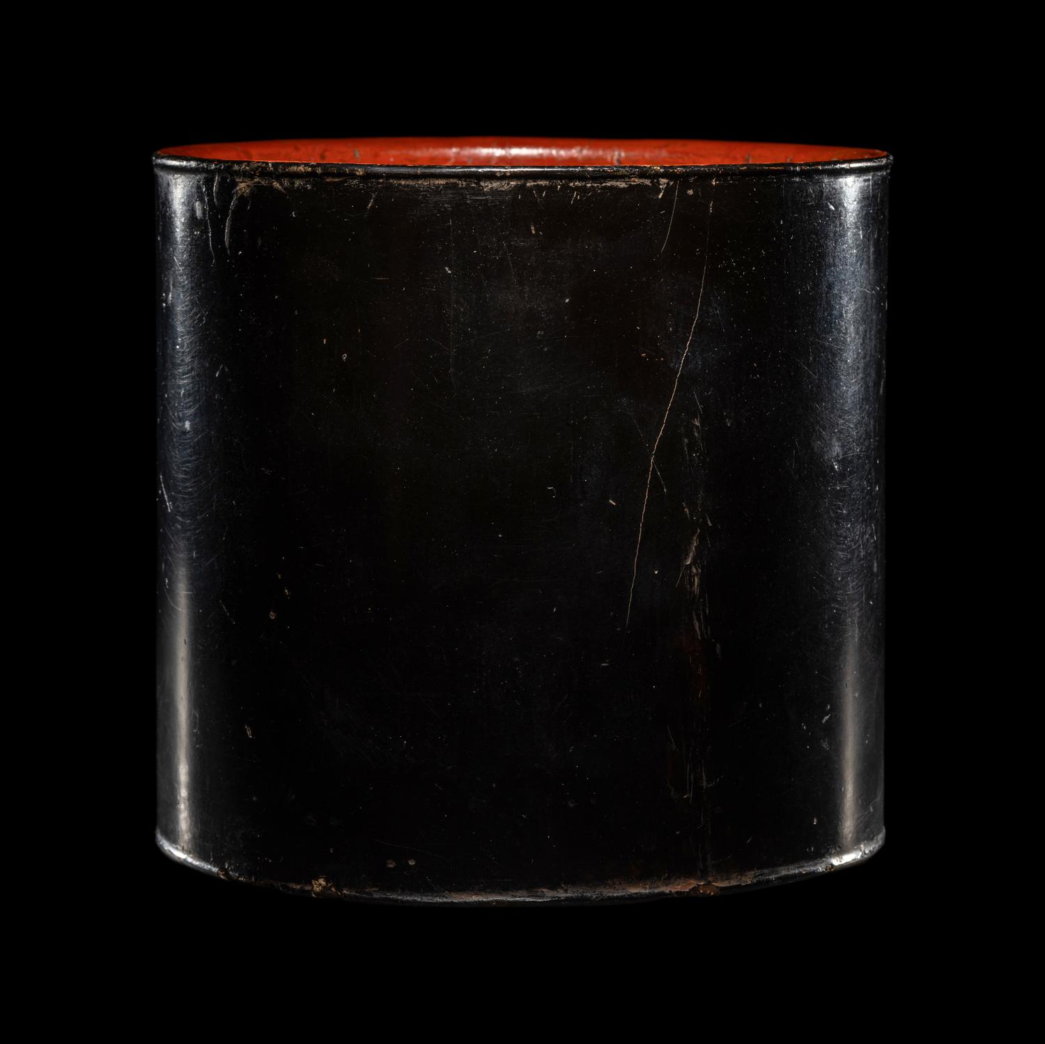 A Chinese Black and Red Lacquered Brushpot, Bitong, Wanli Mark 萬曆丙午（1606）款黑漆素面筆筒