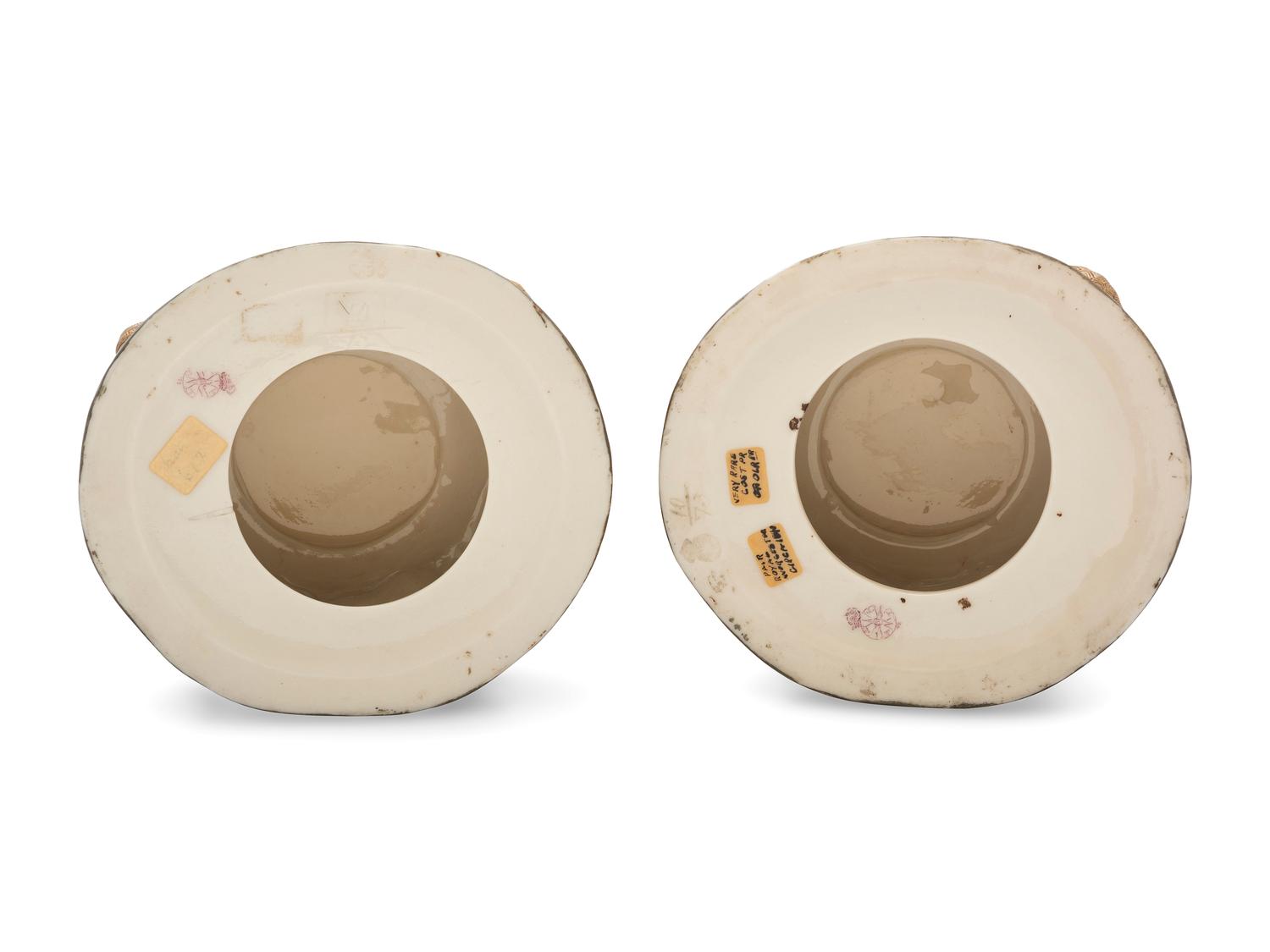 A Pair of Royal Worcester Aesthetic Movement Parcel Gilt Porcelain Vases