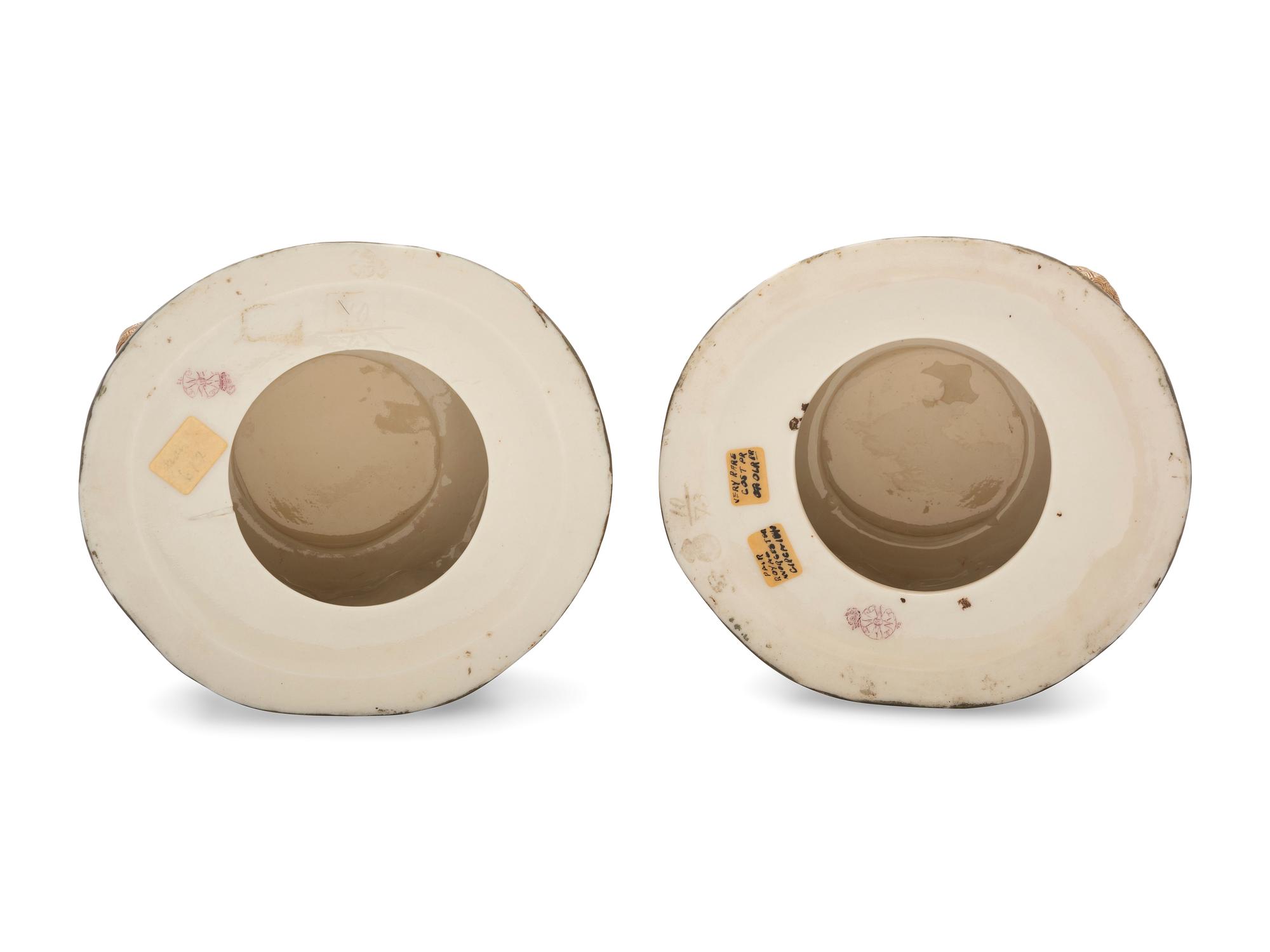 A Pair of Royal Worcester Aesthetic Movement Parcel Gilt Porcelain Vases