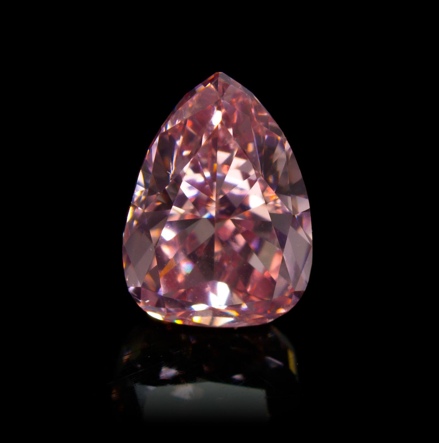 A 1.34 Carat Pear Shape Fancy Intense Pink Diamond,
