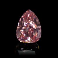 A 1.34 Carat Pear Shape Fancy Intense Pink Diamond,