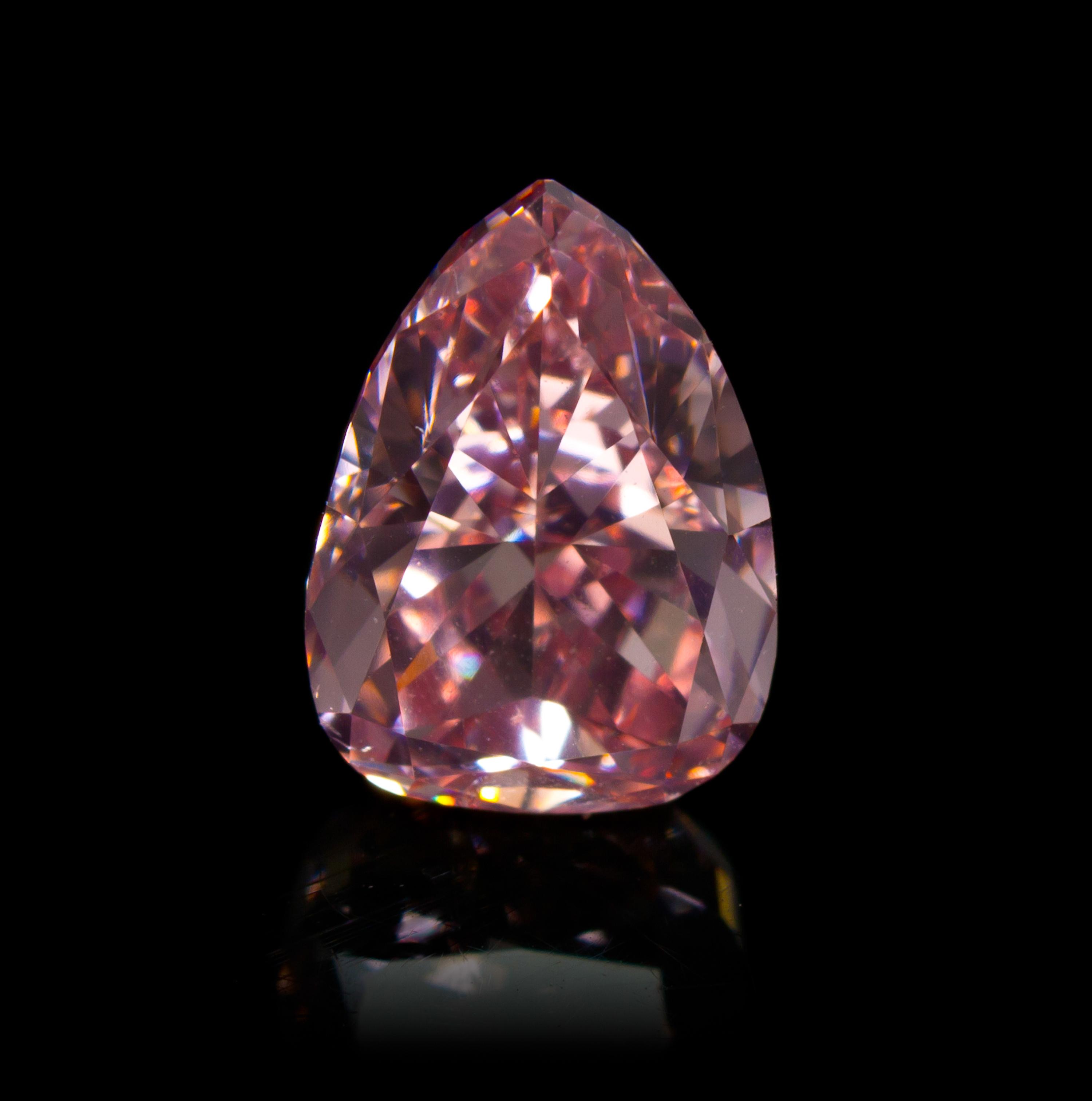 A 1.34 Carat Pear Shape Fancy Intense Pink Diamond,