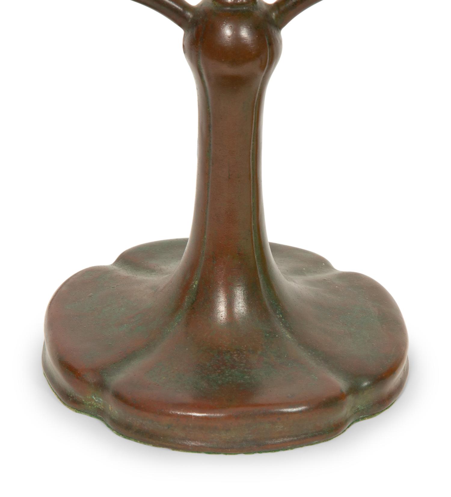 A Handel Bronze Desk Lamp and Two Steuben Aurene Glass Shades