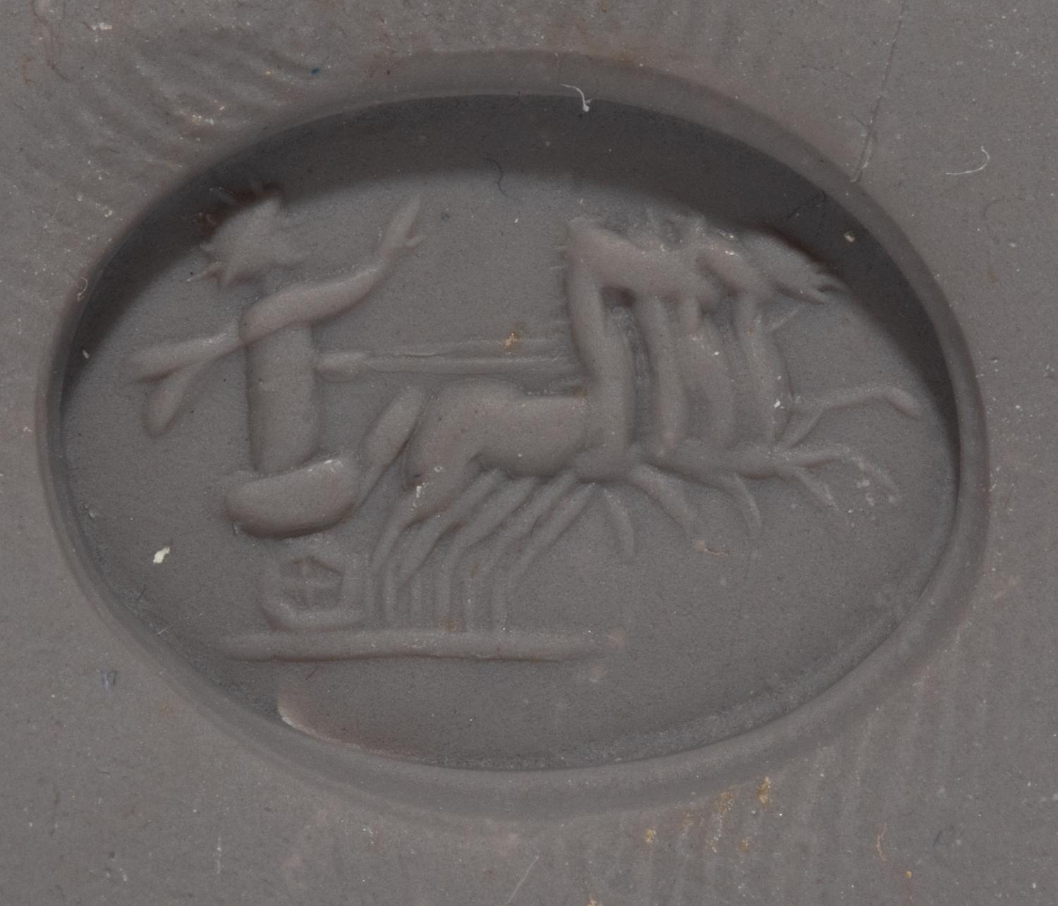 A Bloodstone Ring Stone with Helios Driving a Quadriga