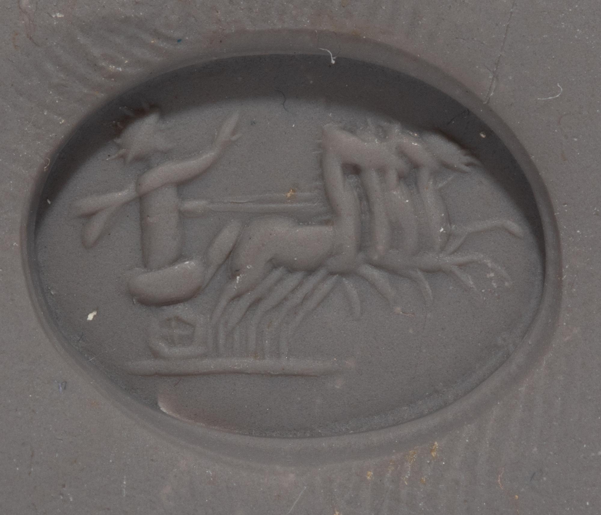 A Bloodstone Ring Stone with Helios Driving a Quadriga