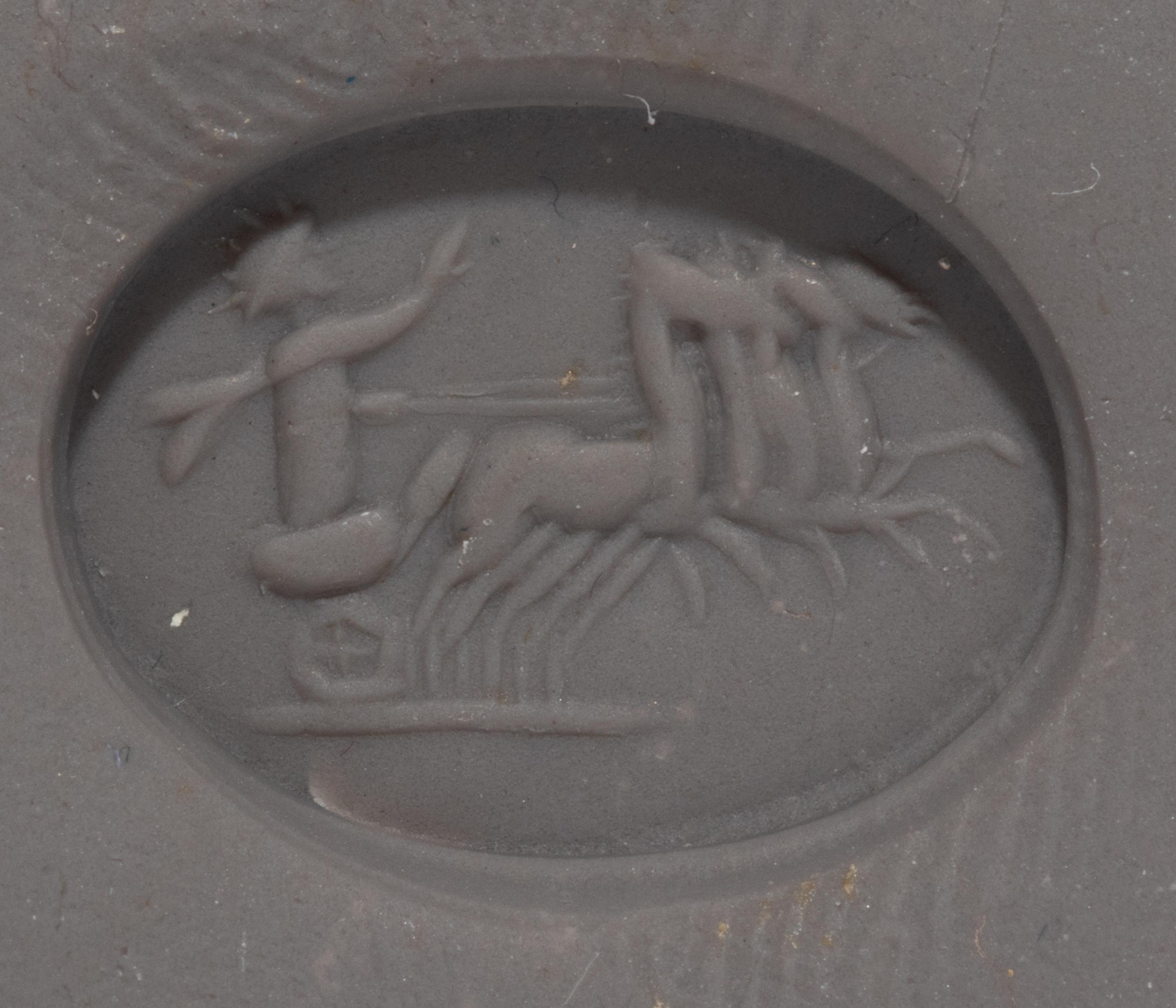 A Bloodstone Ring Stone with Helios Driving a Quadriga