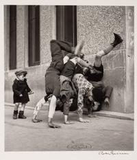 A pair of photographs ( Trois Petits Enfants Blancs , 1971; Les Pieds Aux Murs , 1934)