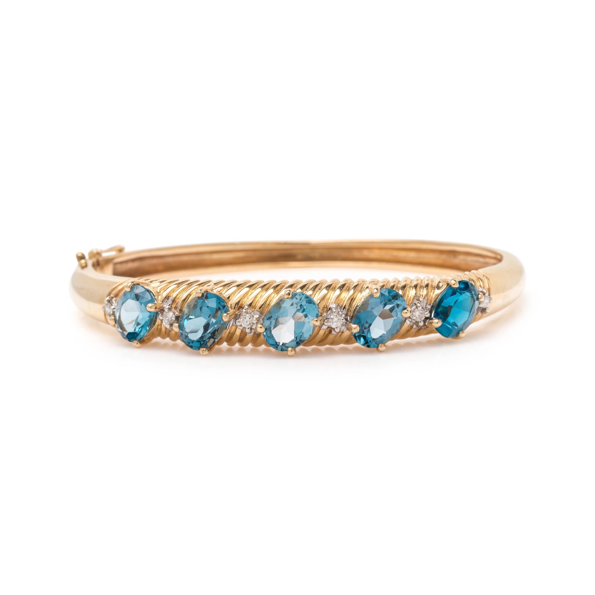 YELLOW GOLD, BLUE TOPAZ AND DIAMOND BANGLE BRACELET