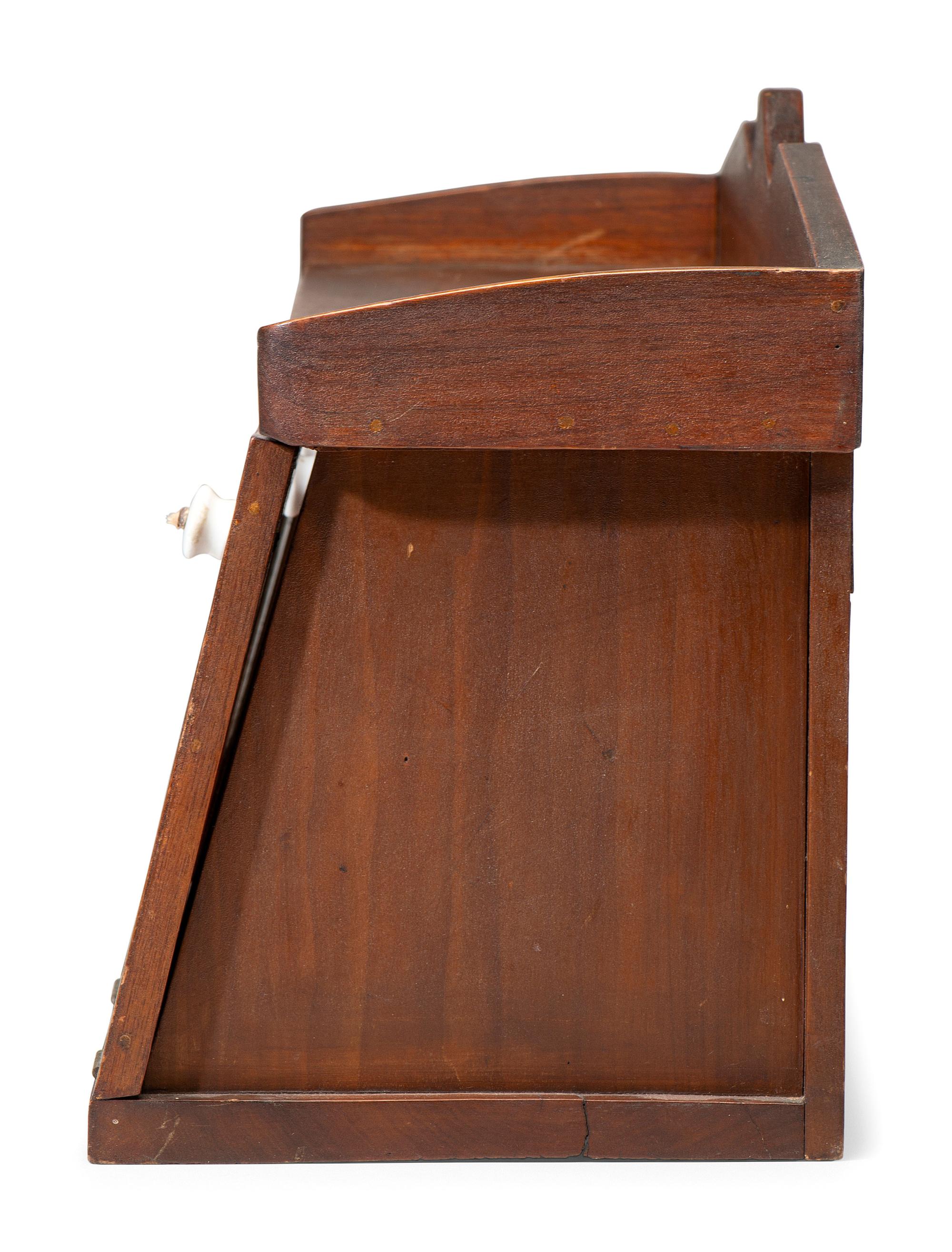 A Late Classical Parcel Gilt Desk Cupboard
