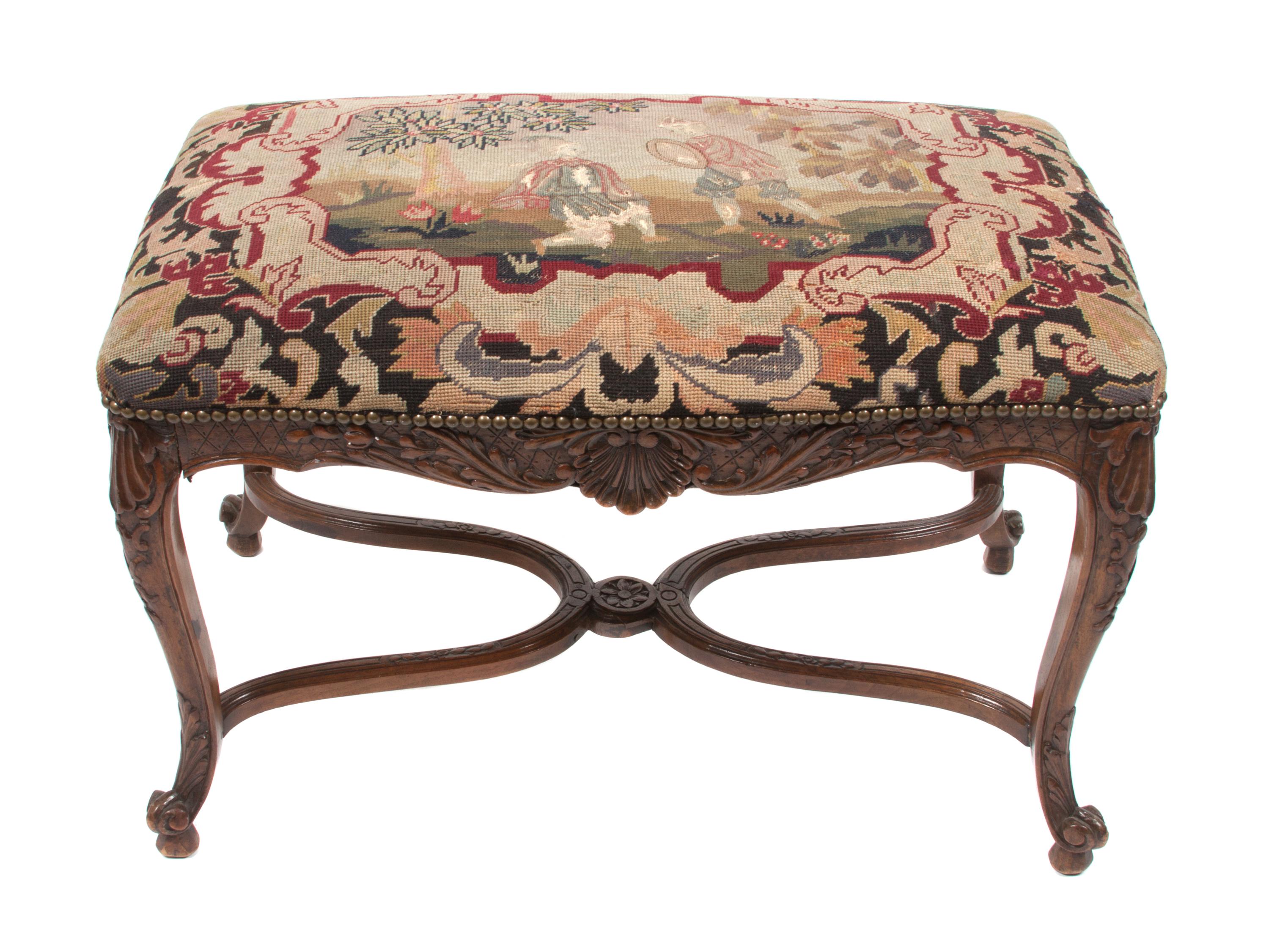 A Louis XV Style Walnut Bench Height 20 x width 30 1/4 x depth 19 inches.