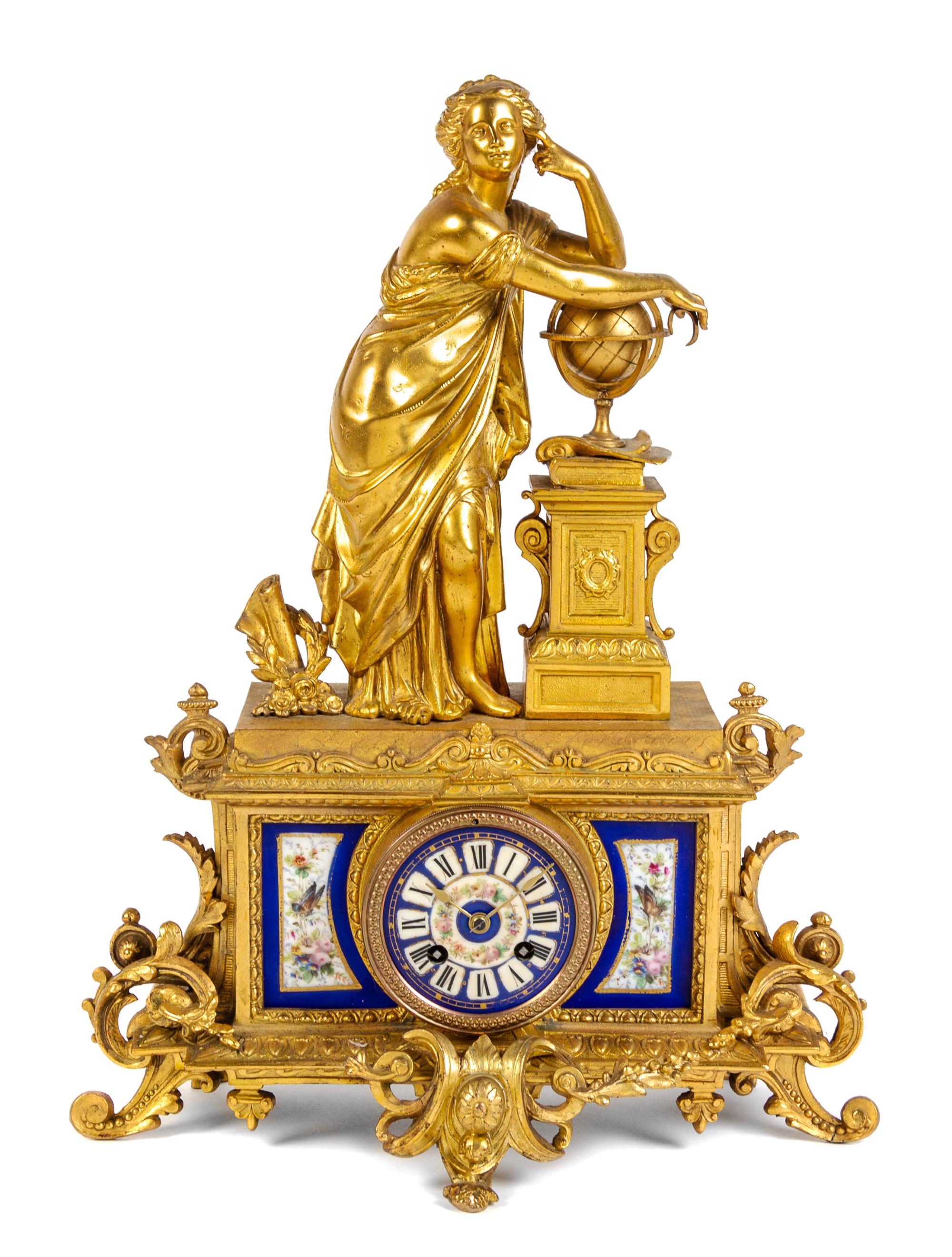 A Continental Gilt Metal and Porcelain Inset Figural Mantel Clock Height 9 inches. — PH. MOREY, RETAILED BY TIFFANY & CO., 19TH CENTURY